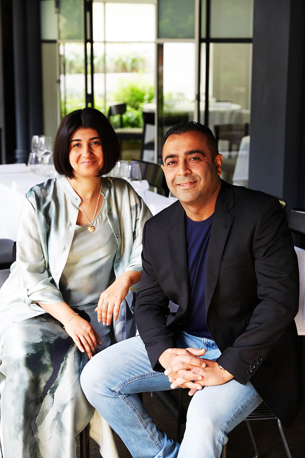 Sid and Chand Sahrawat at Sid At The French Cafe. Chand wears Jane Daniel's shirt dress and slip dress. Photo / Rebecca Zephyr Thomas