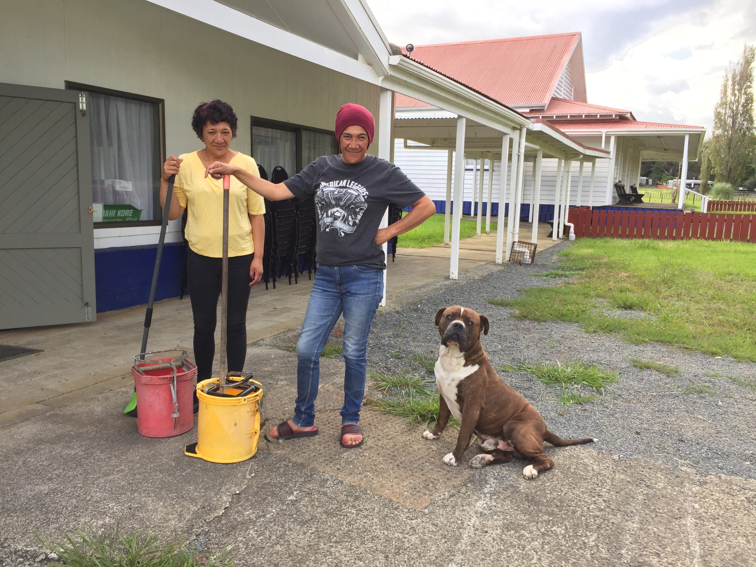 Sisters Pepi (left) and Tracey Tau at Ahikiwi Marae north of Dargaville after cleaning their marae's wharekai [dining area] following Kaihu River floodwaters raging through the building during Cyclone Gabrielle. Their neighbour had to drive across paddocks in his truck to rescue the pair as floodwaters rose.
