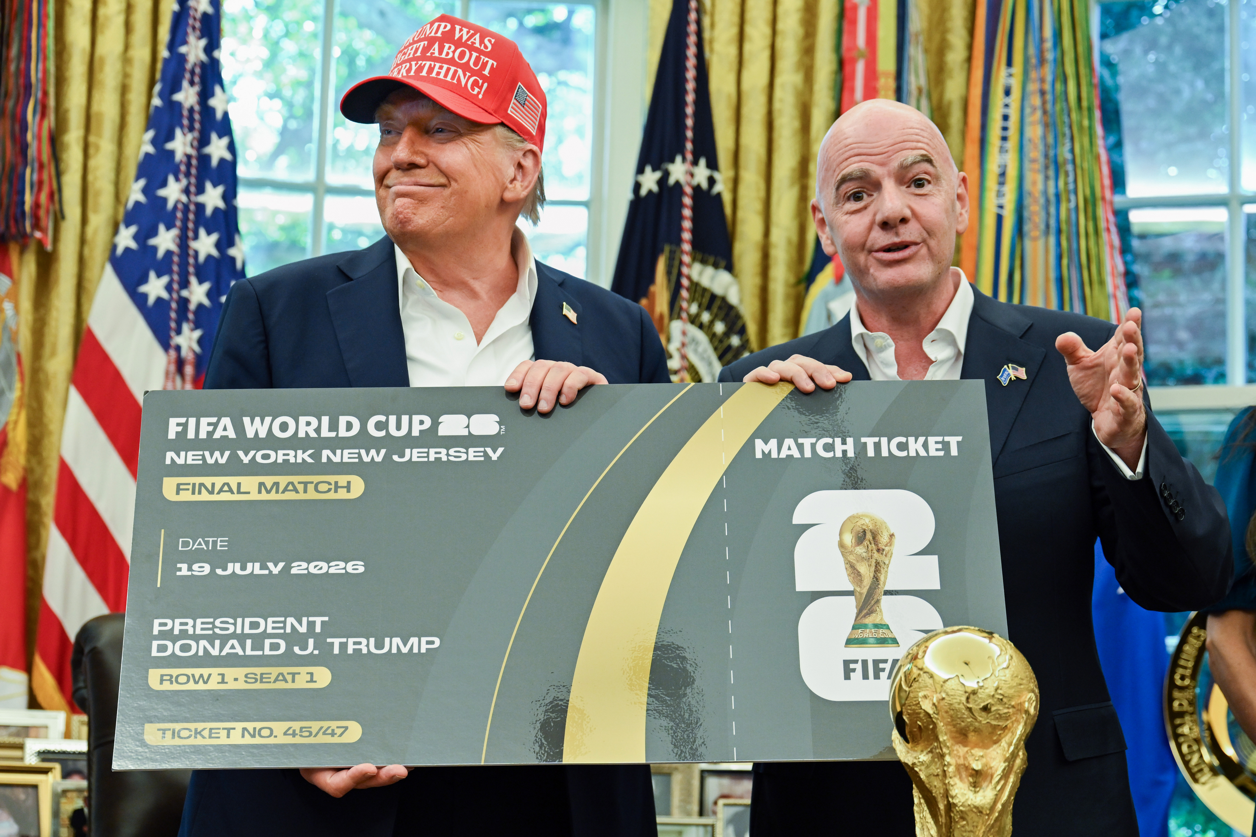 Gianni Infantino, the president of Fifa, presents Donald Trump with a ticket for the Fifa World Cup final. Photo / Getty Images