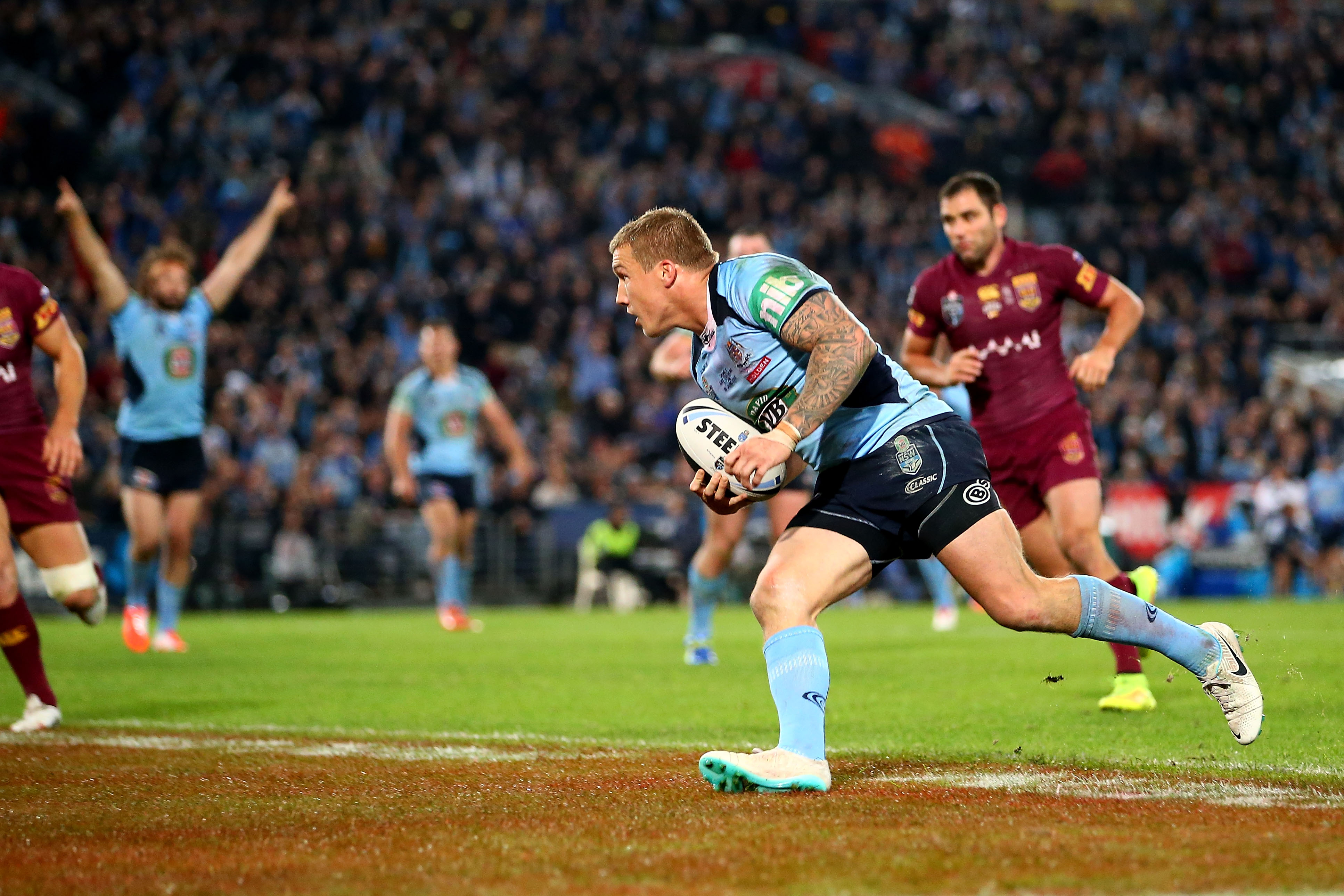 Trent Hodkinson scores the match-winning try in the second State of Origin clash in 2014. Photo / Getty Images