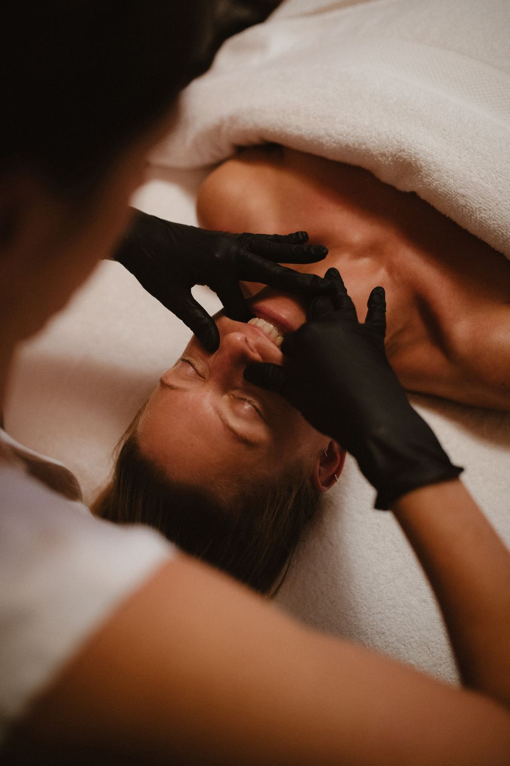 Rachel's treatment extends to buccal massage, too, which calls for intra-oral massage techniques. Photo / Sophie Miya-Smith
