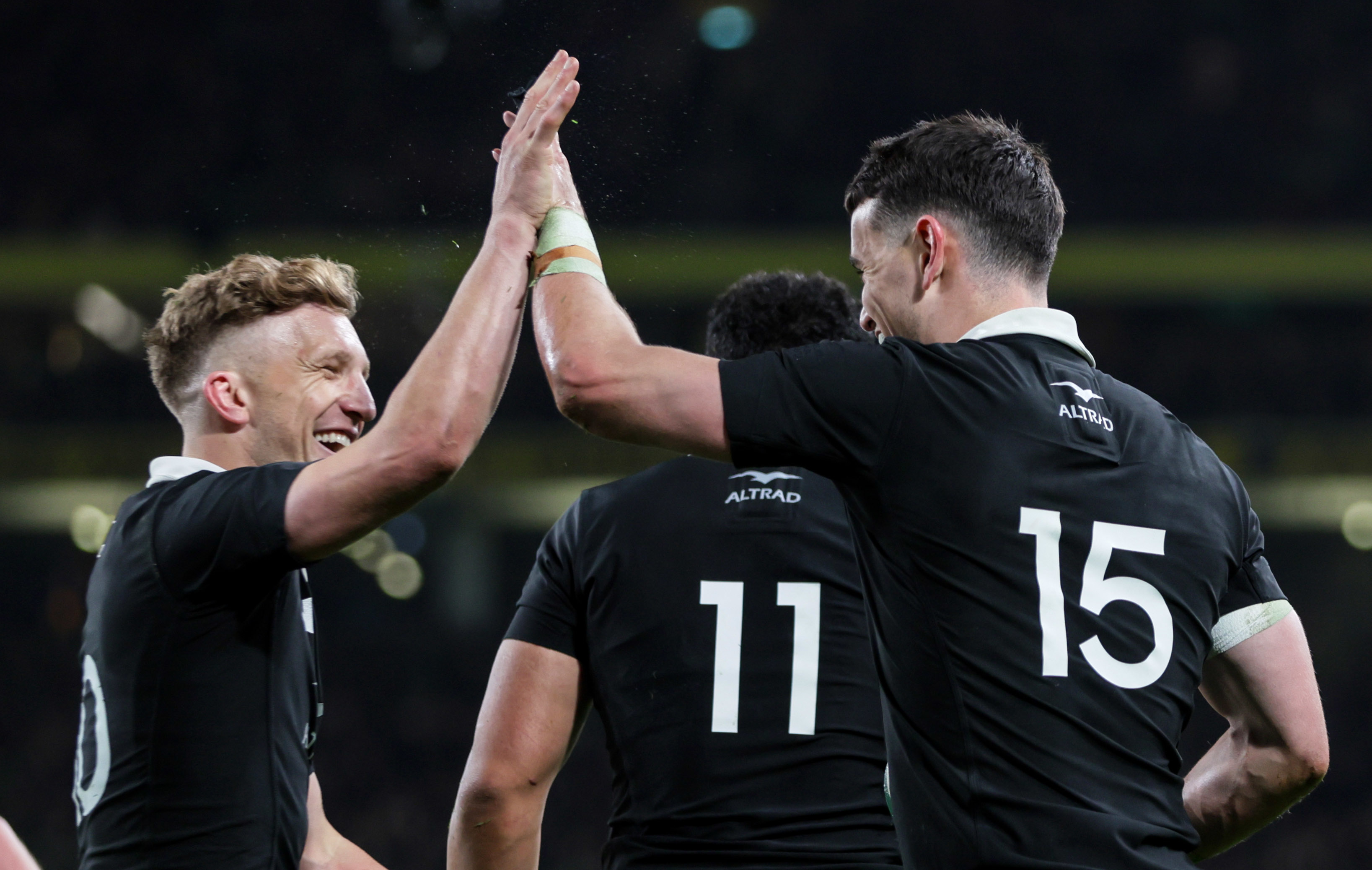 Will Jordan (right) celebrates with Damian McKenzie after scoring against Ireland last year. Photo / Photosport