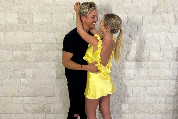 Liam Lawson and partner Hannah St John.