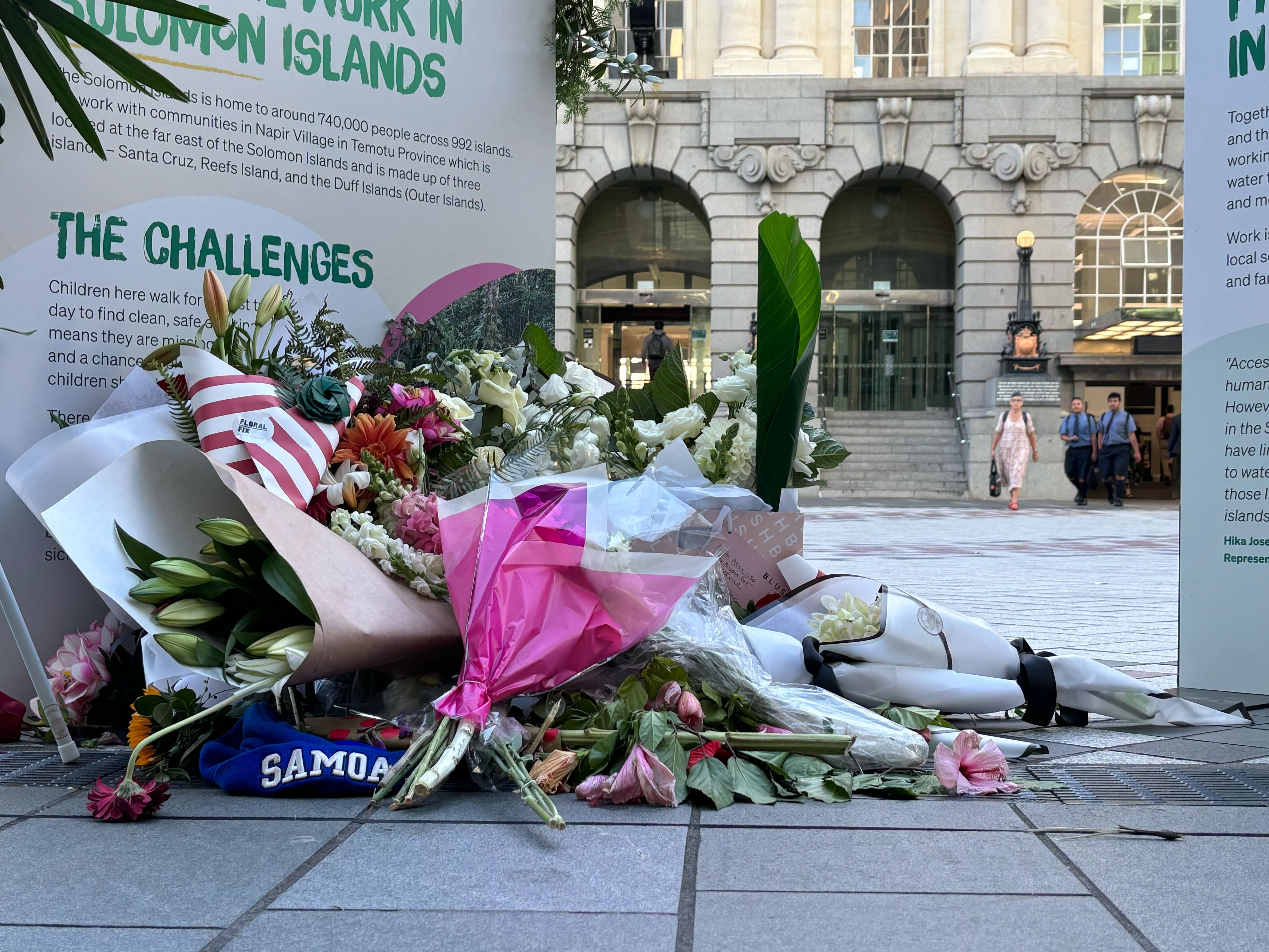 People have laid flowers in Auckland's Britomart where Fa'anānā  Efeso Collins died at a charity event. Photo / Edward Swift