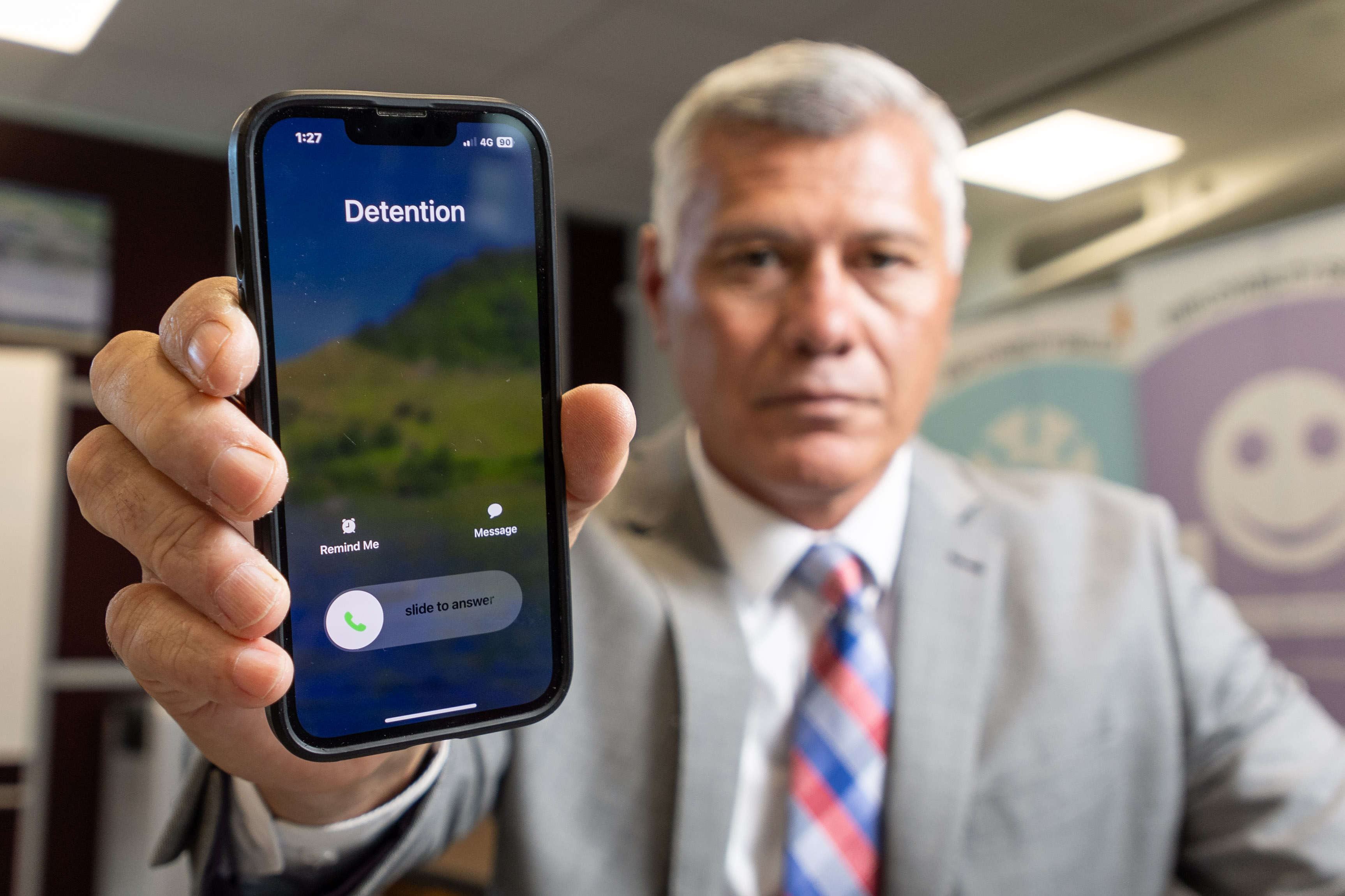 It's all in the pouch: Principal changes his mind on mobile phone