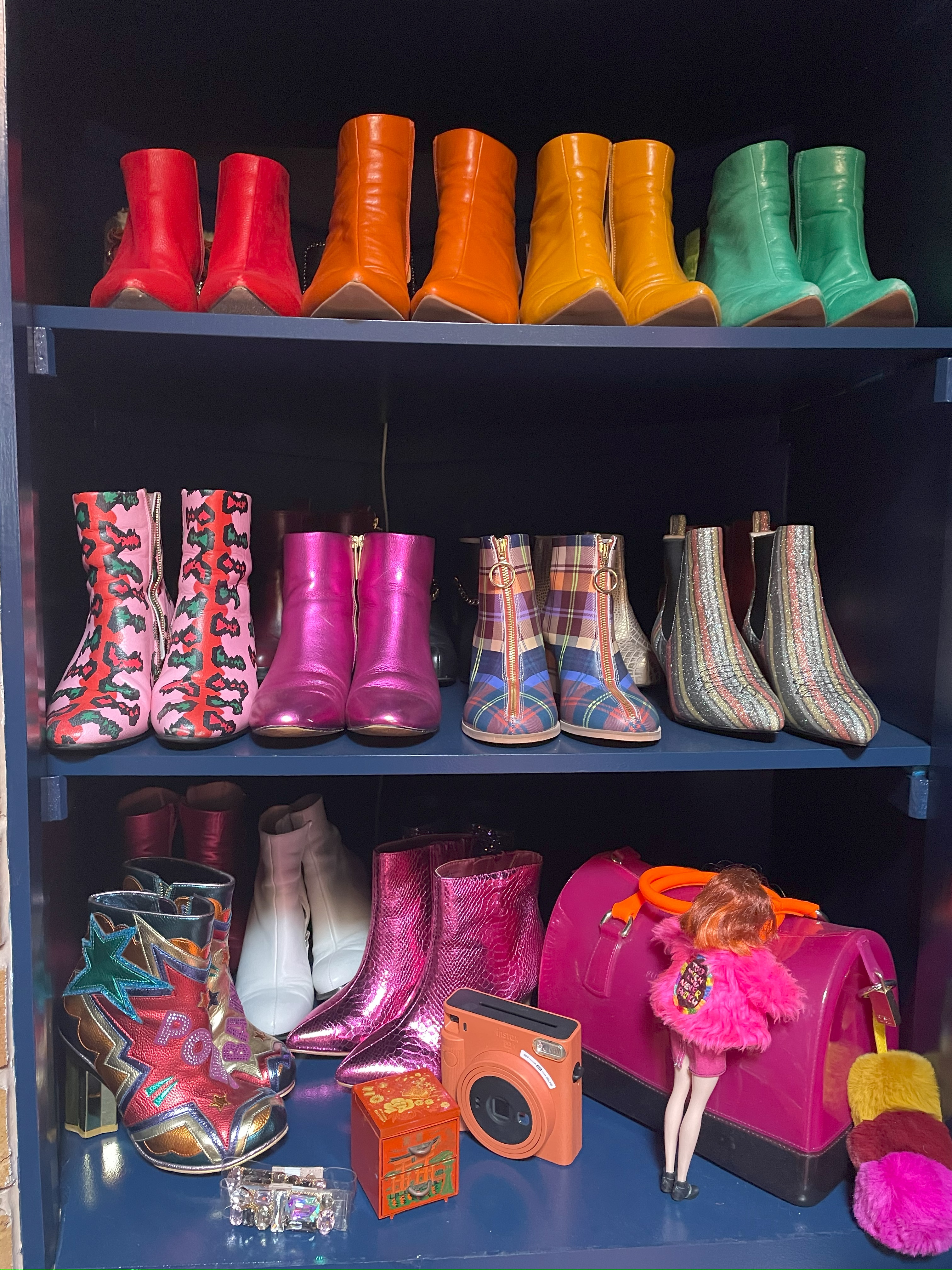 The boots in Evie’s wardrobe are as colourful as her home decor.