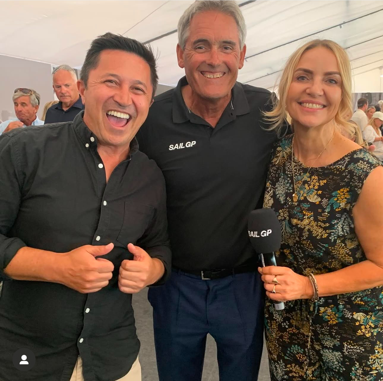 Mike Puru and Melanie Homer, pictured with Sir Russell Coutts, centre, were the MCs for the VIP marquee the Adrenaline Lounge at Sail GP.