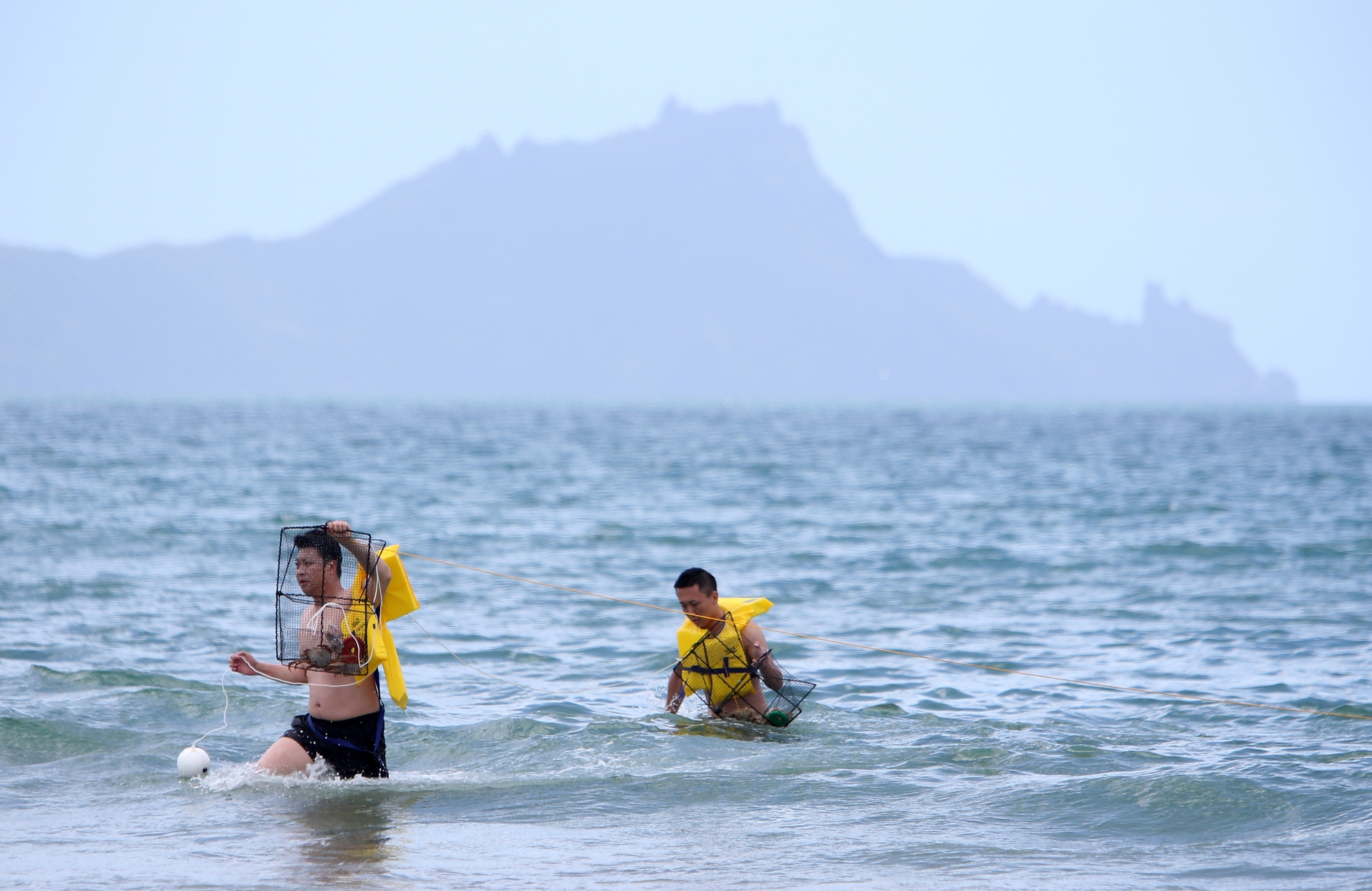 Crab fishers were hard at work at Uretiti yesterday. Photo / Michael Cunningham