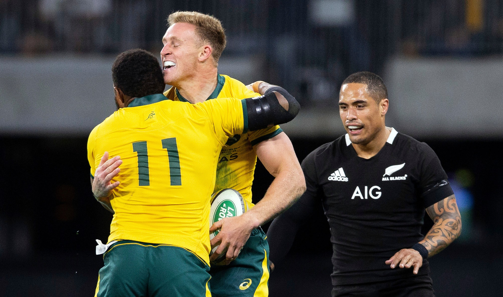 Marika Koroibete of the Wallabies celebrates with Reece Hodge. Photo / Photosport