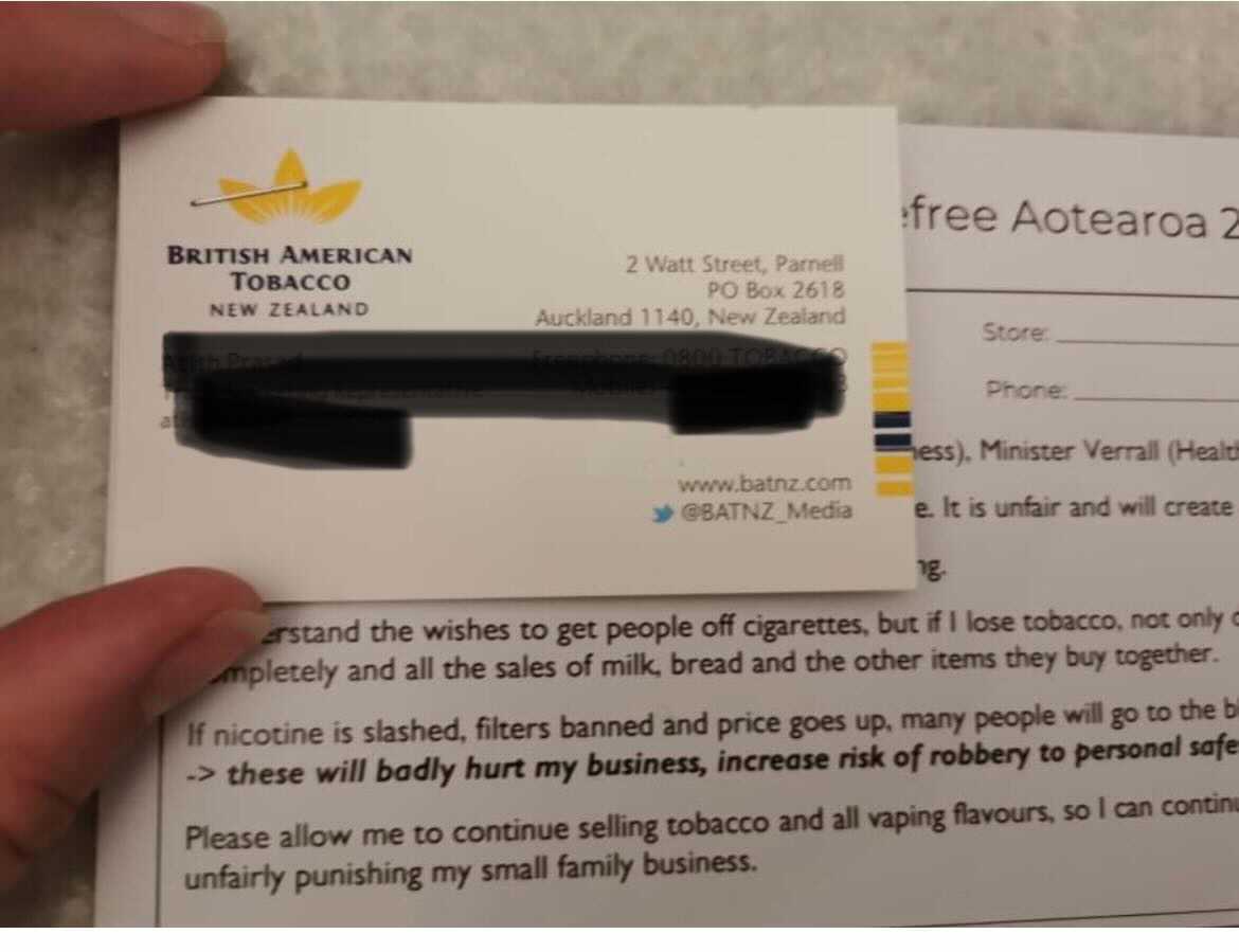 The postcard sent to dairy owners, with a British American Tobacco business card attached. Thousands of postcards were delivered to Parliament today.  