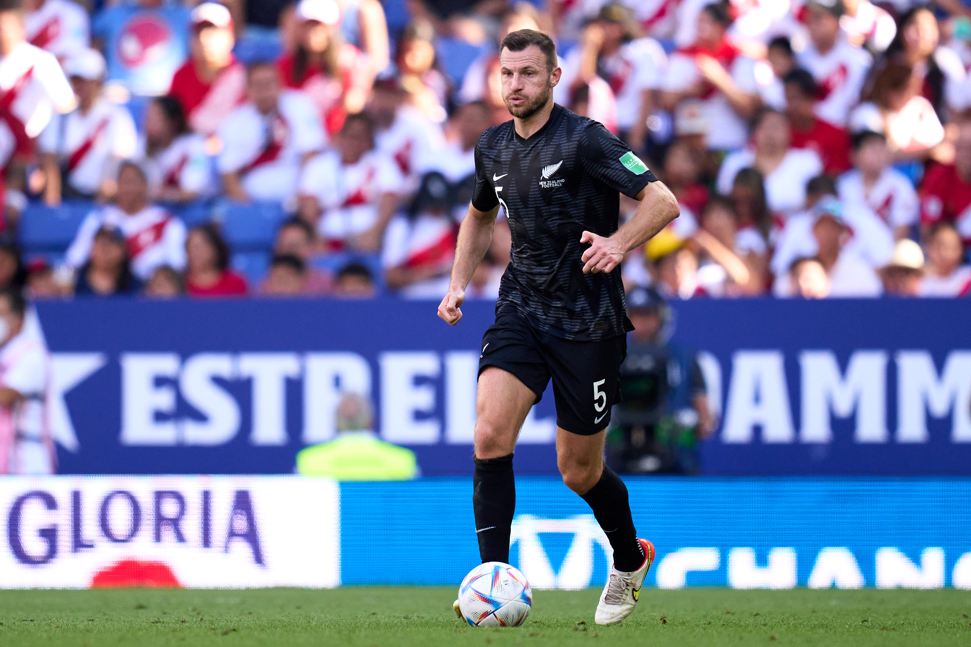 All Whites defender Tommy Smith looks for options in the warm-up match against Peru. Photo / Getty Images