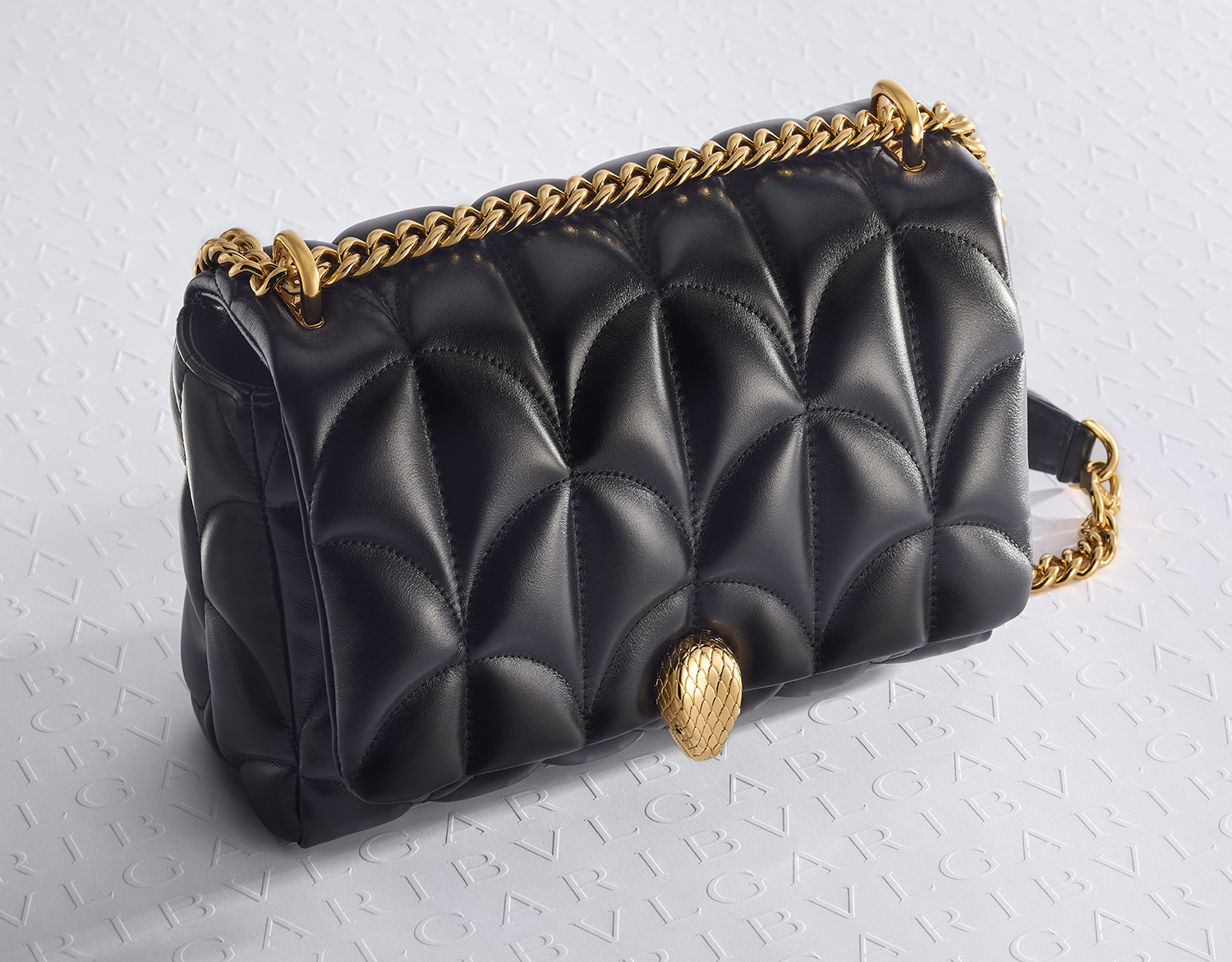 The new ‘Serpenti Sugarloaf’ is a padded-volume nappa shoulder bag that draws both its form and name from the rare high-domed variant of Bulgari’s signature cabochon cut diamond.