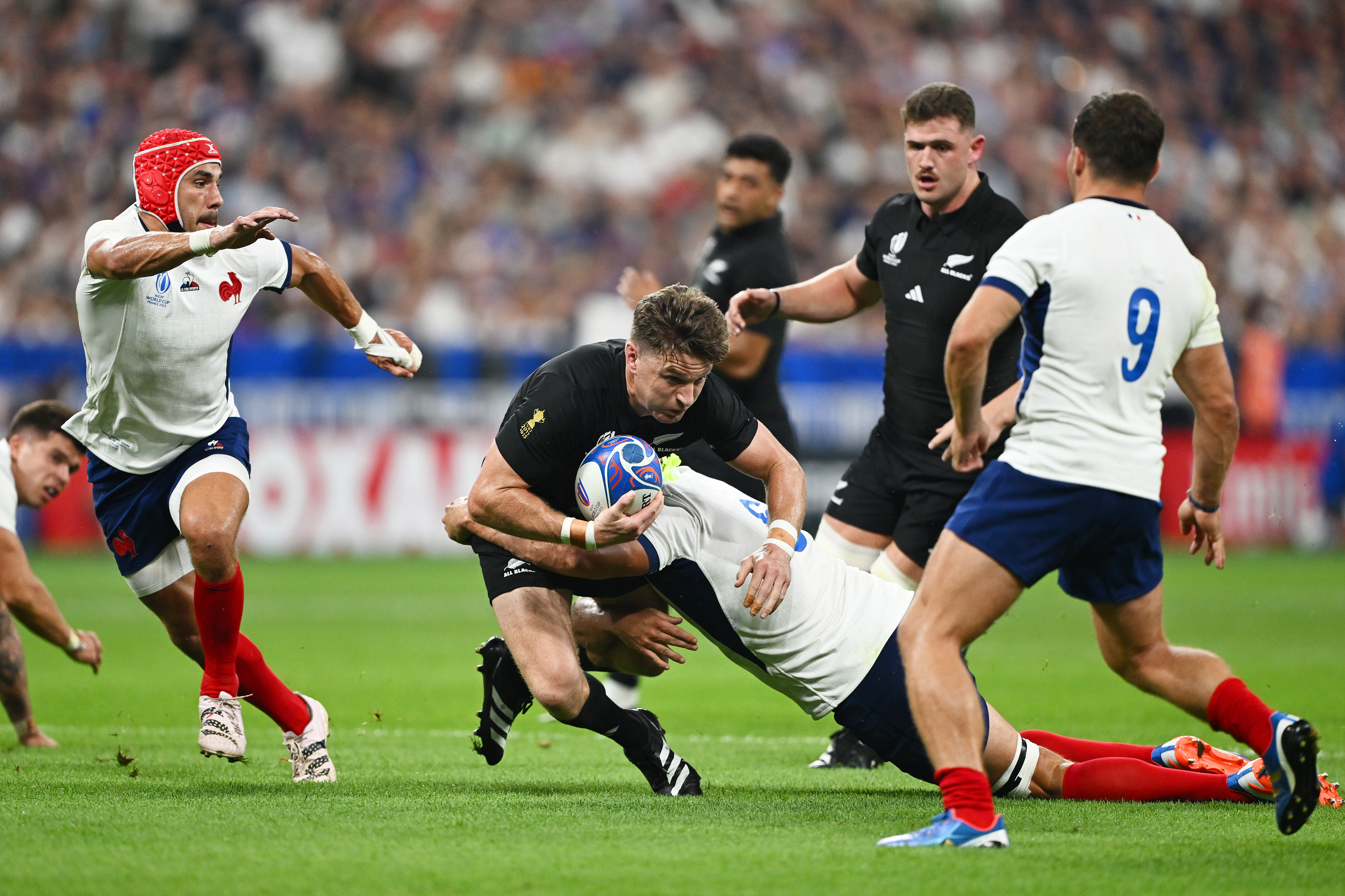 Beauden Barrett is tackled by Francois Cros of France. Photo / Getty Images