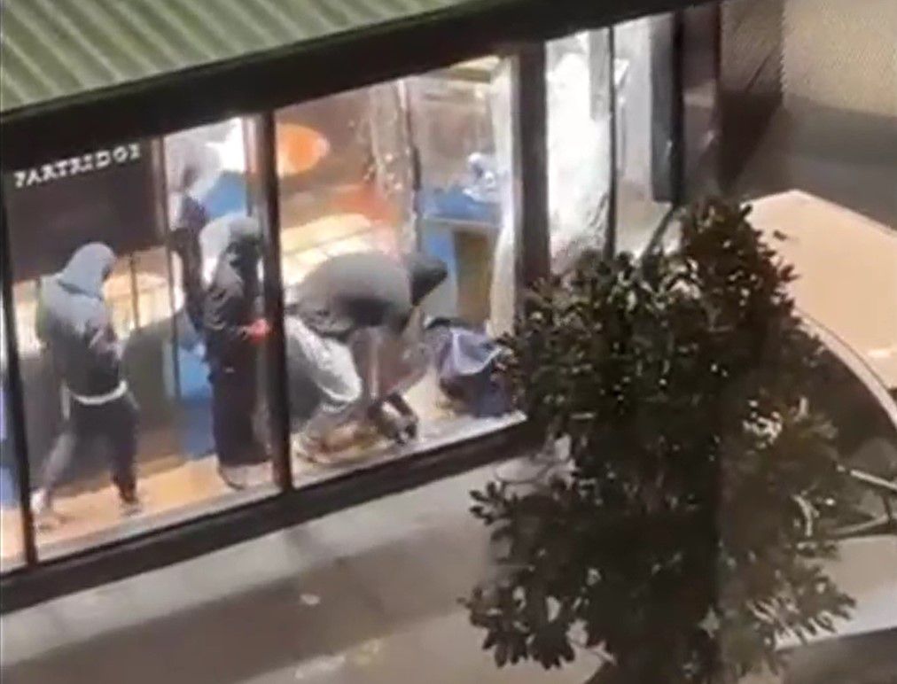 A still taken from a security camera shows the ram raiders after they broke into a Newmarket jewellery store on Friday evening.