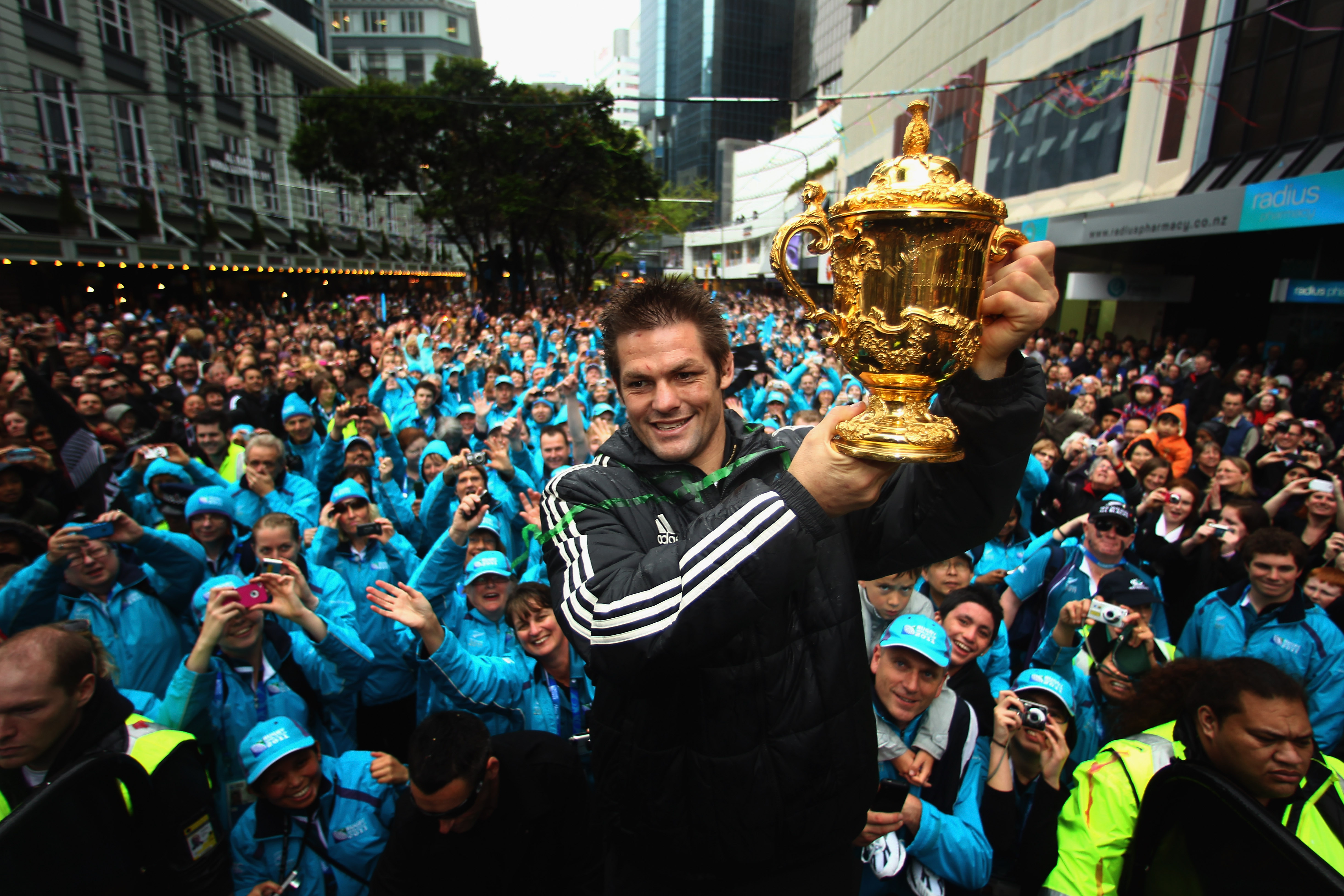 Richie McCaw holds up the Webb Ellis Cup to the delight of the crowd. Photo / Getty Images