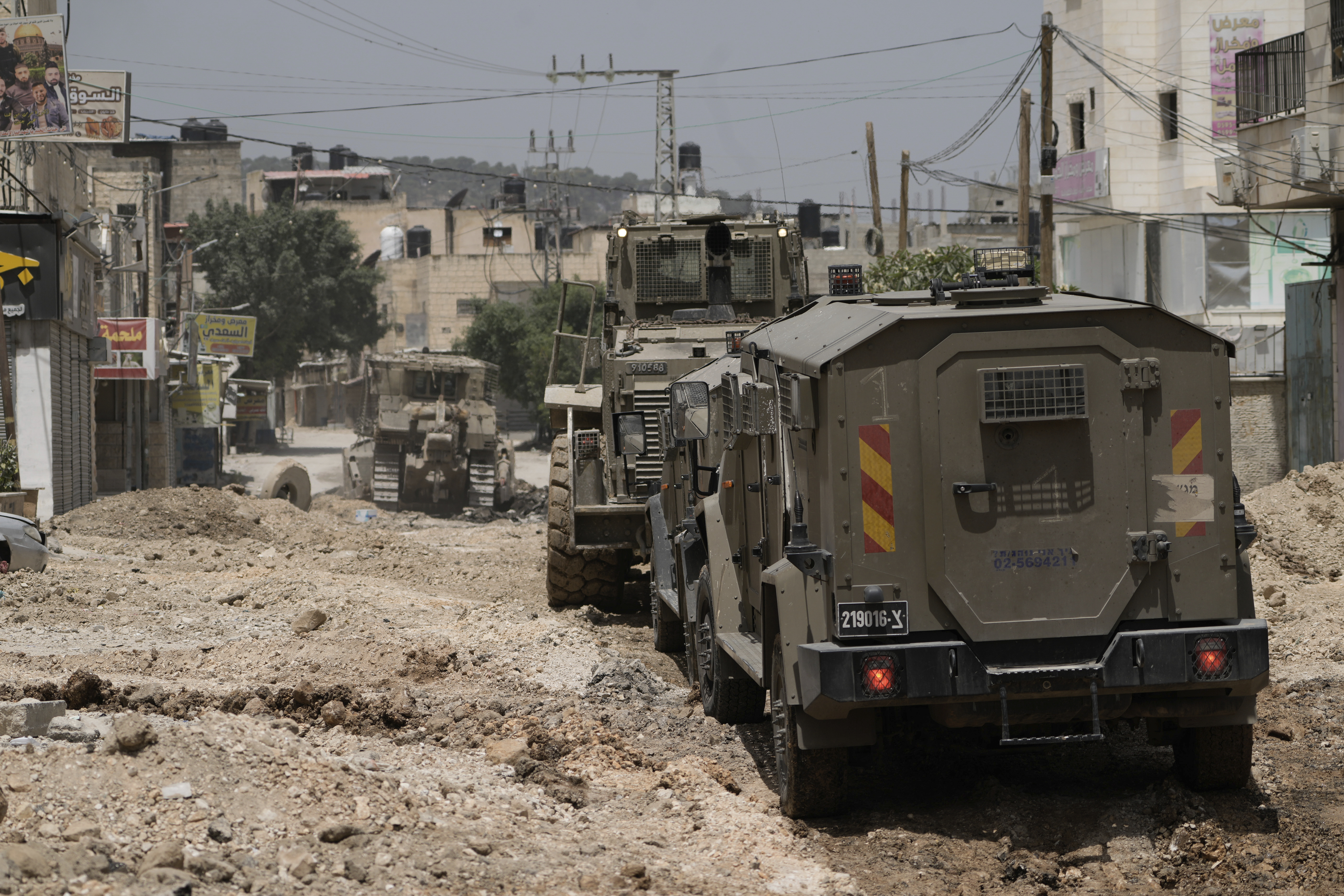 Israeli military vehicles during a raid in the West Bank Jenin refugee camp. Photo / AP