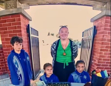 Te Kura o Mangateretere principal Grace Ropitini with students during a school fundraiser. The school community has been raising money to support resources and facilities.