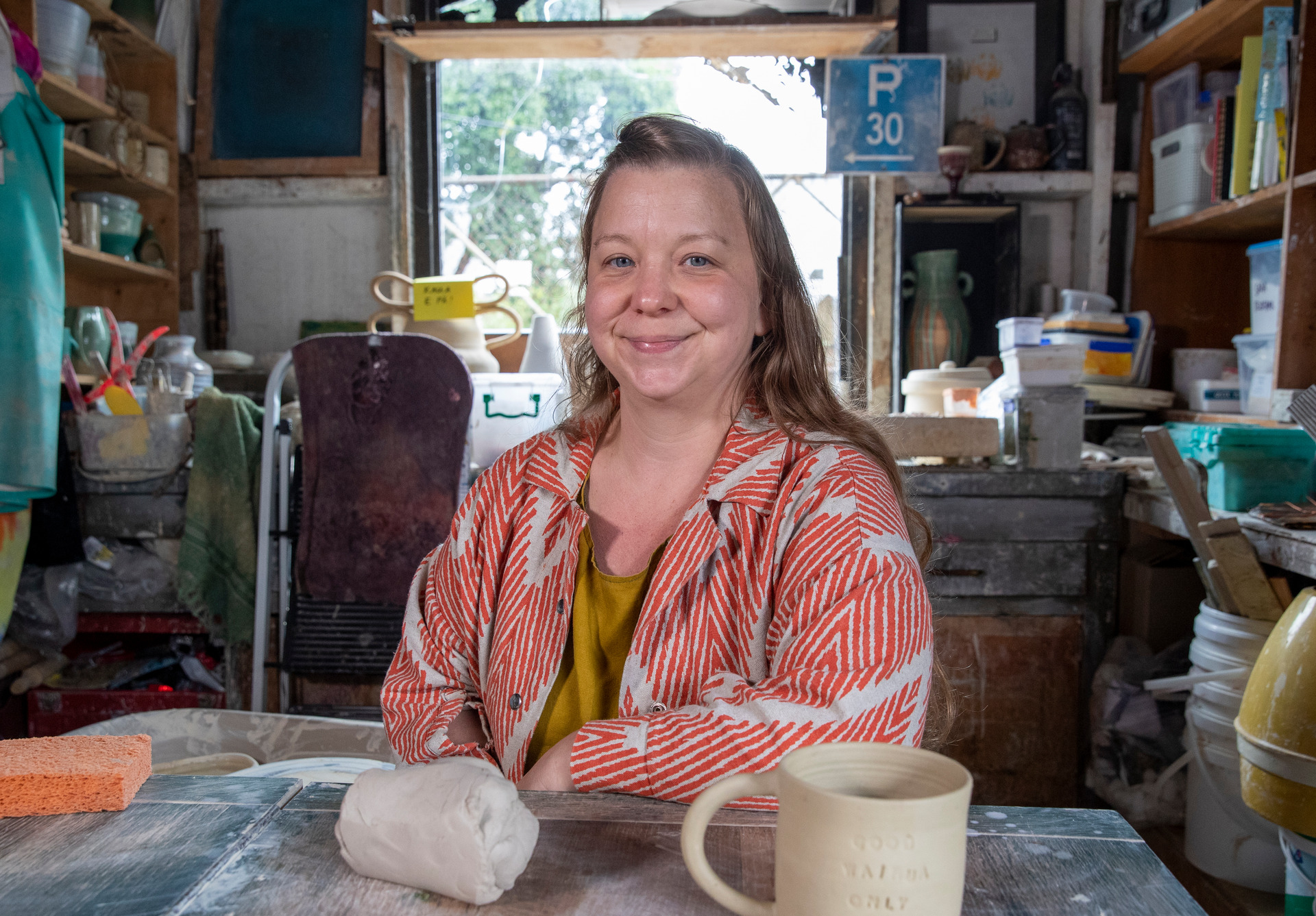 Nicole Gaston, a keen pottery maker, in her Wellington studio. She says a settlement meeting brokered by the Privacy Commissioner was