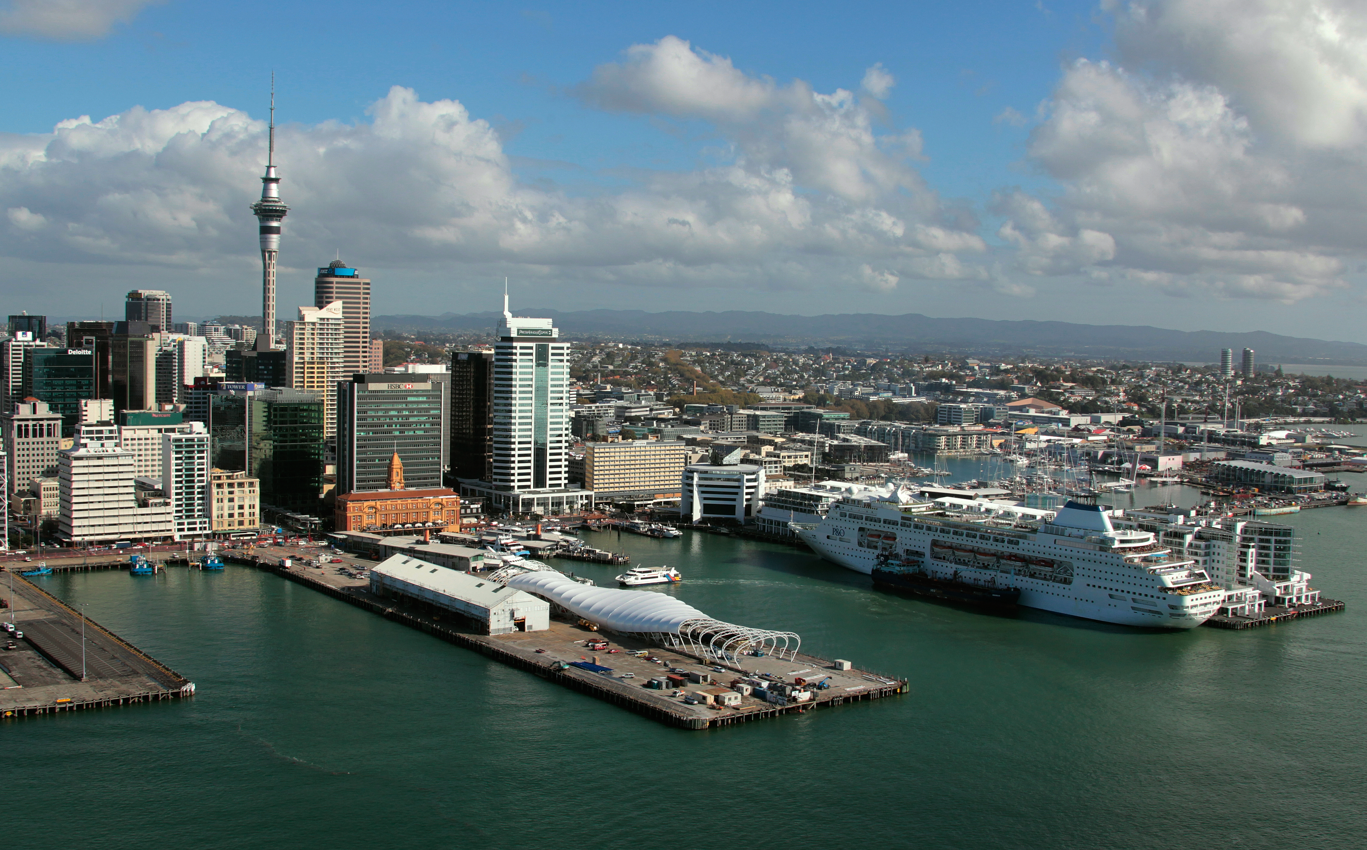 An aerial view of a cruise ship berthed at Auckland's Queens Wharf. More than $600 million was injected into Auckland in the last financial year, supporting 4184 jobs. Photo / NZME