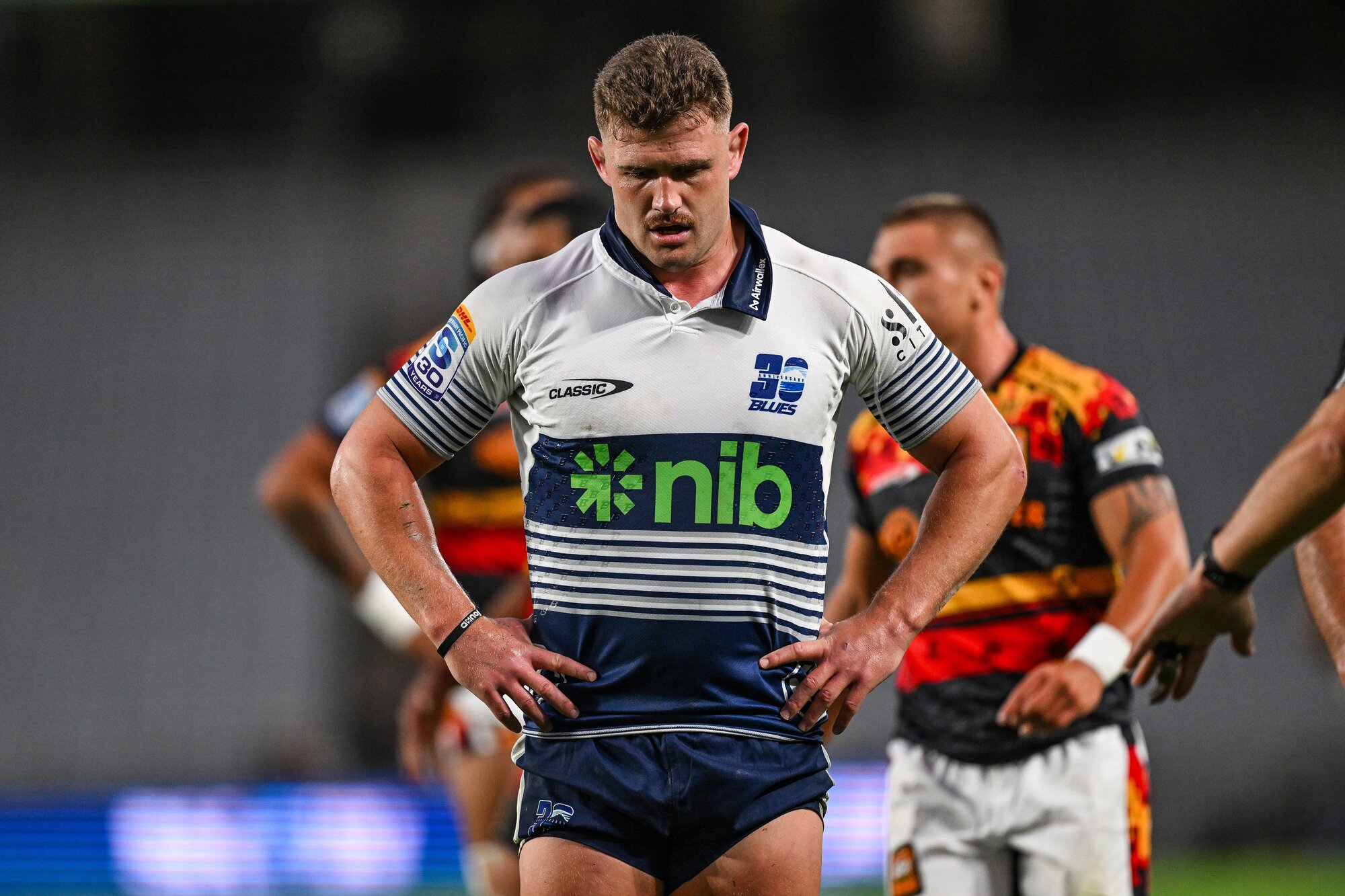 Blues skipper Dalton Papali'i takes a moment to catch his breath in his side's opening-round defeat to the Chiefs. Photo / Photosport
