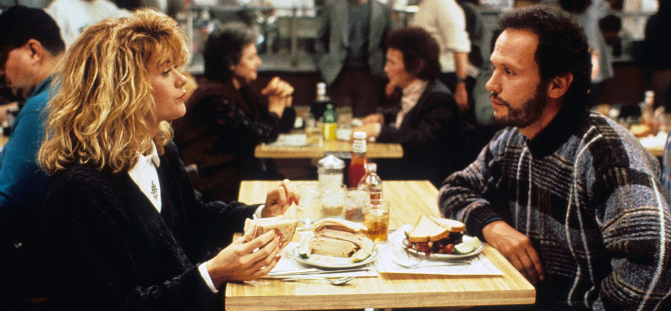 Meg Ryan and Billy Crystal in the, ah, climatic scene of the hit rom-com film When Harry Met Sally.
