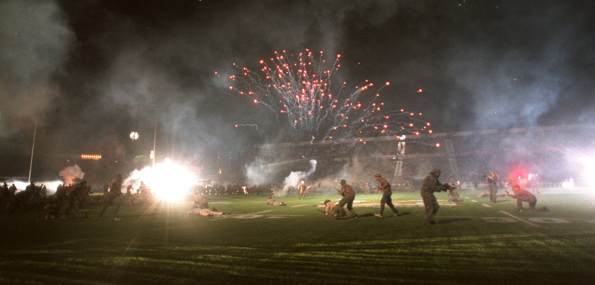 Smoke and soldiers fill the Ericsson stadium in the pre match build up to the Winfield Cup season opener between the Warriors and the Brisbane Broncos. Photo / Getty Images