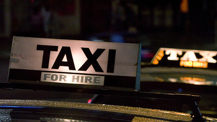 Taxis need a roof light but no longer need to display company names.