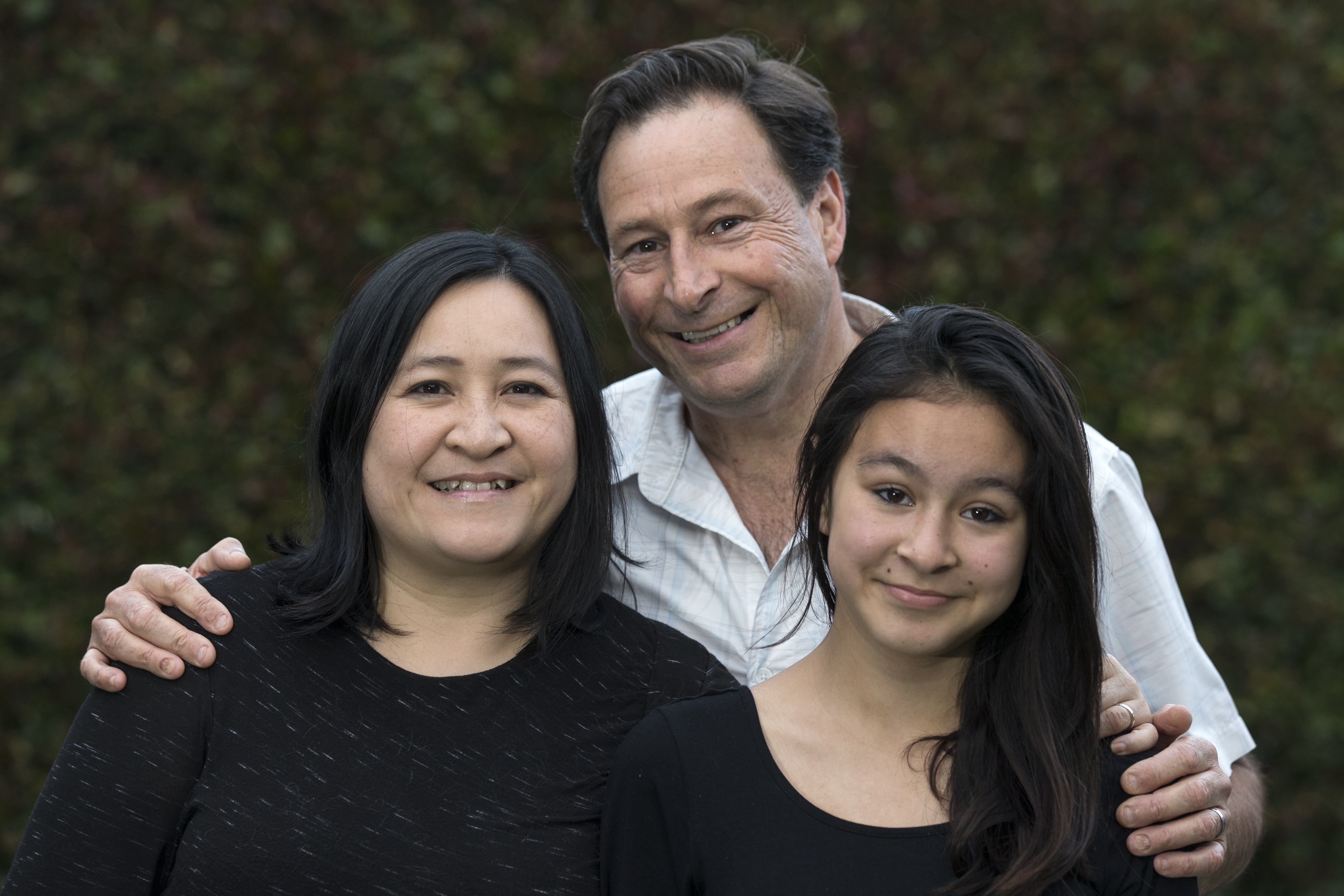 Audrey Tan-Atkinson and Mark Atkinson with their daughter Gloria, 11. Photo / Jason Oxenham