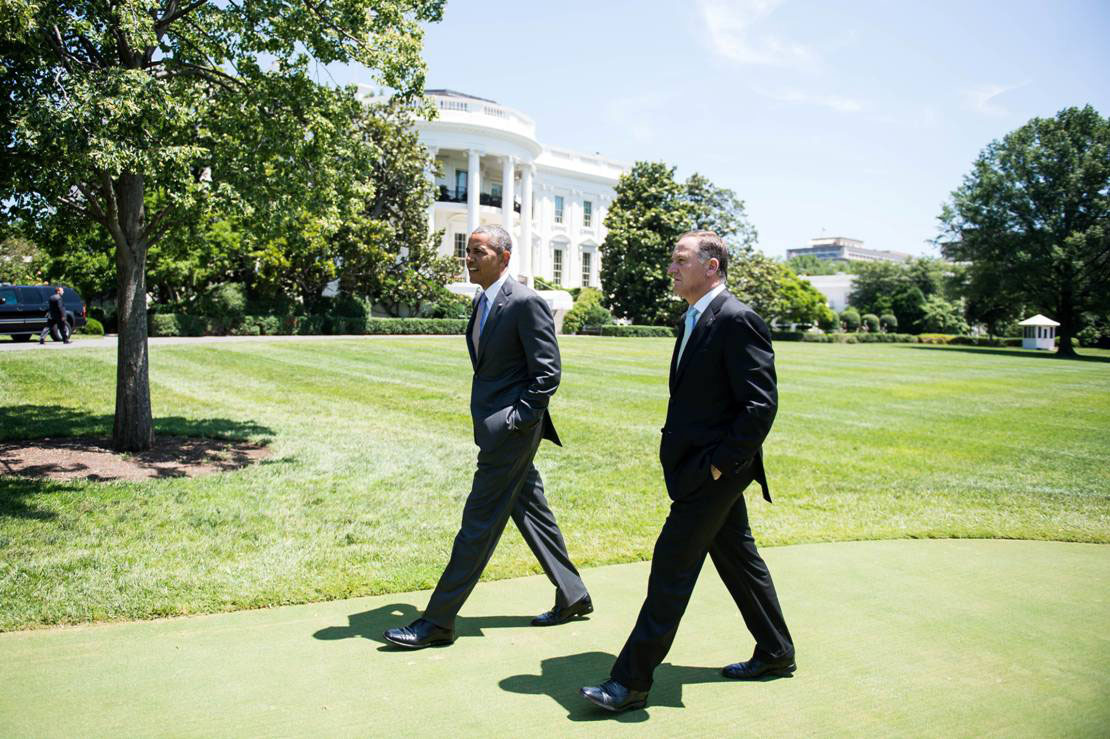 Then Prime Minister John Key and President Barack Obama stroll across the lawn at the White House in 2014. Photo / supplied
