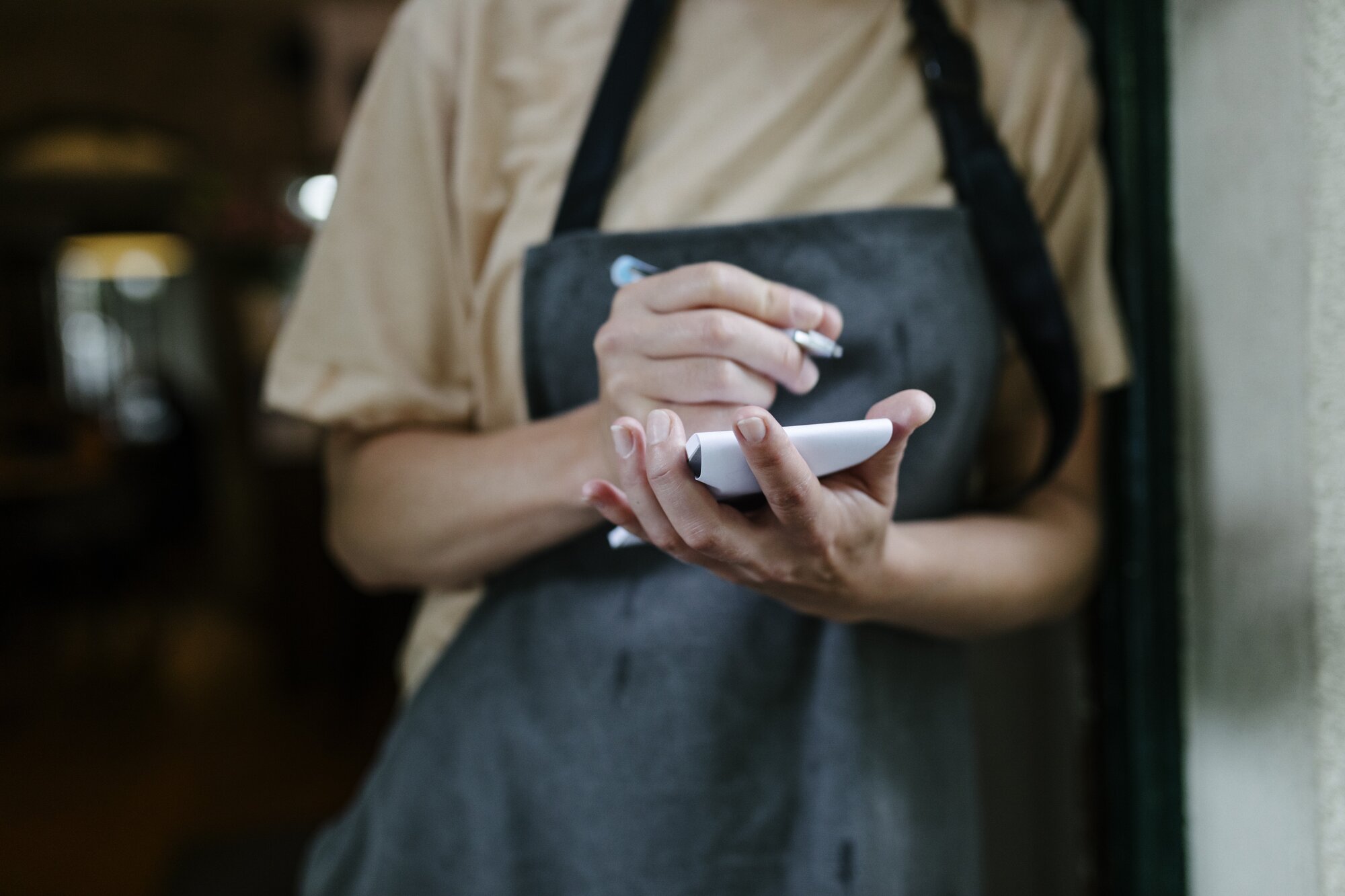 Is your waiter writing down your order or making notes about how annoying you are? Photo / Getty Images