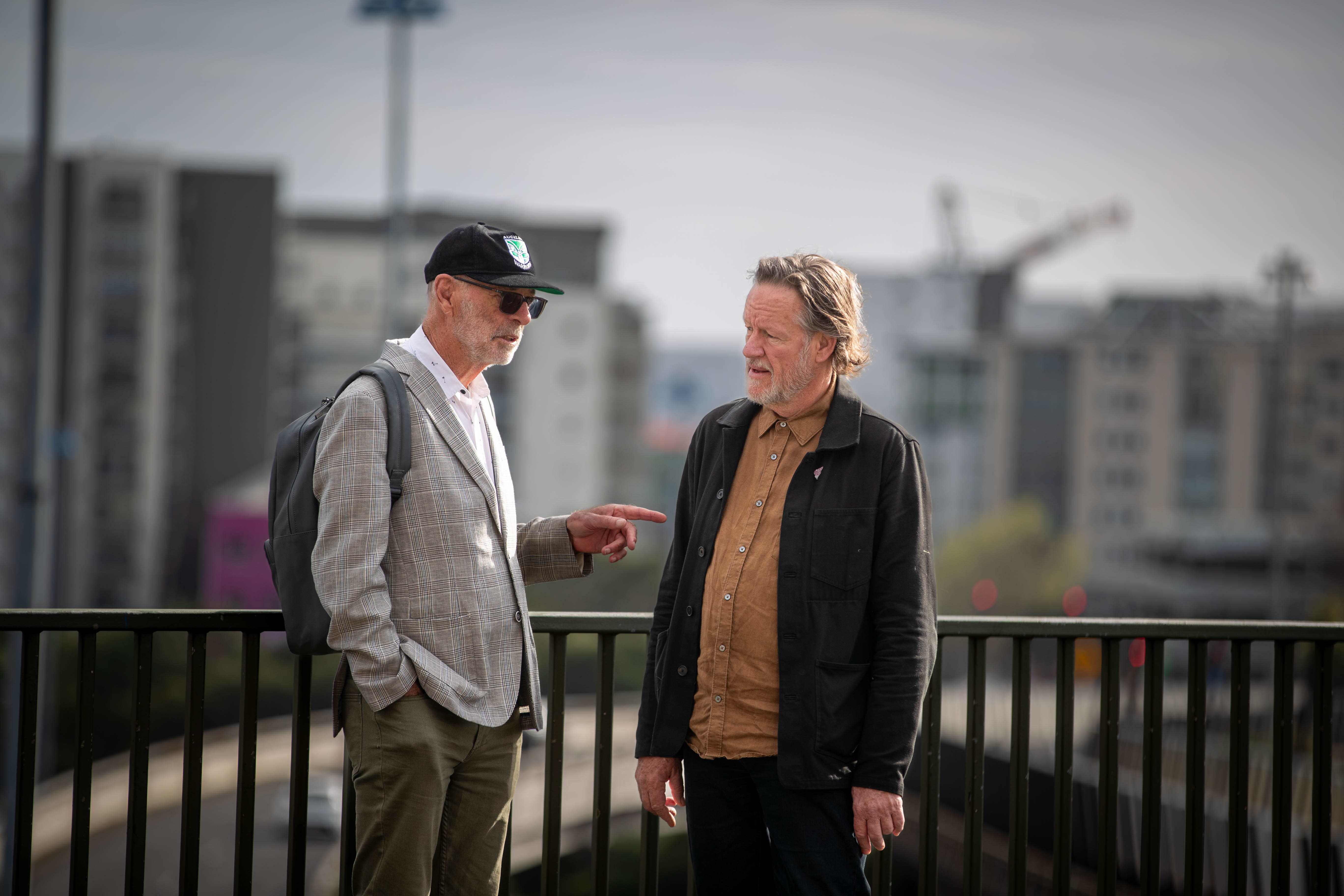 Auckland mayor Wayne Brown in conversation with Simon Wilson, on his way to work on the Hopetoun Bridge.
Photo / Michael Craig