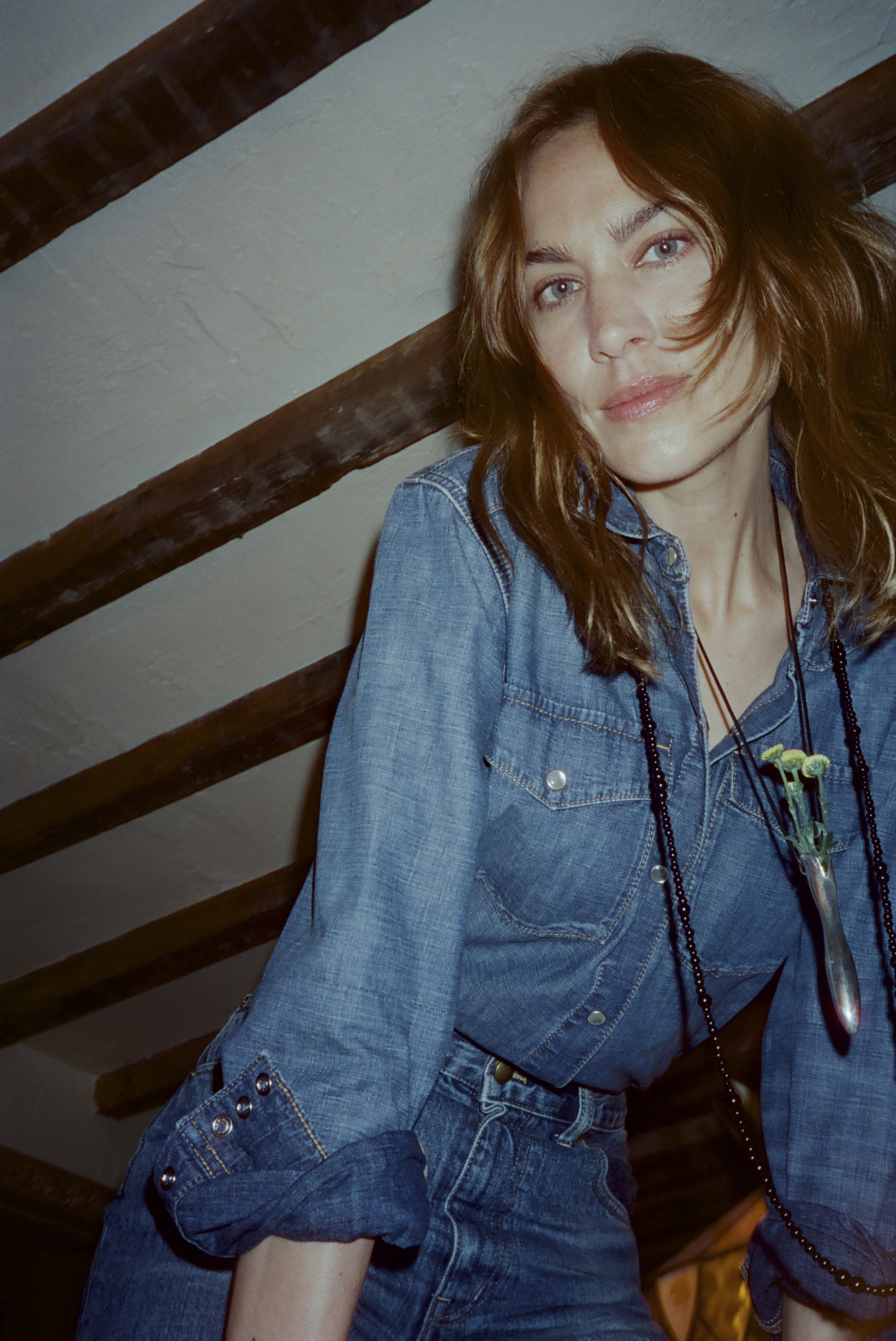 With necklaces by Sophie Buhai, Alexa Chung wore a denim shirt she designed for Madewell. Photo / New York Times