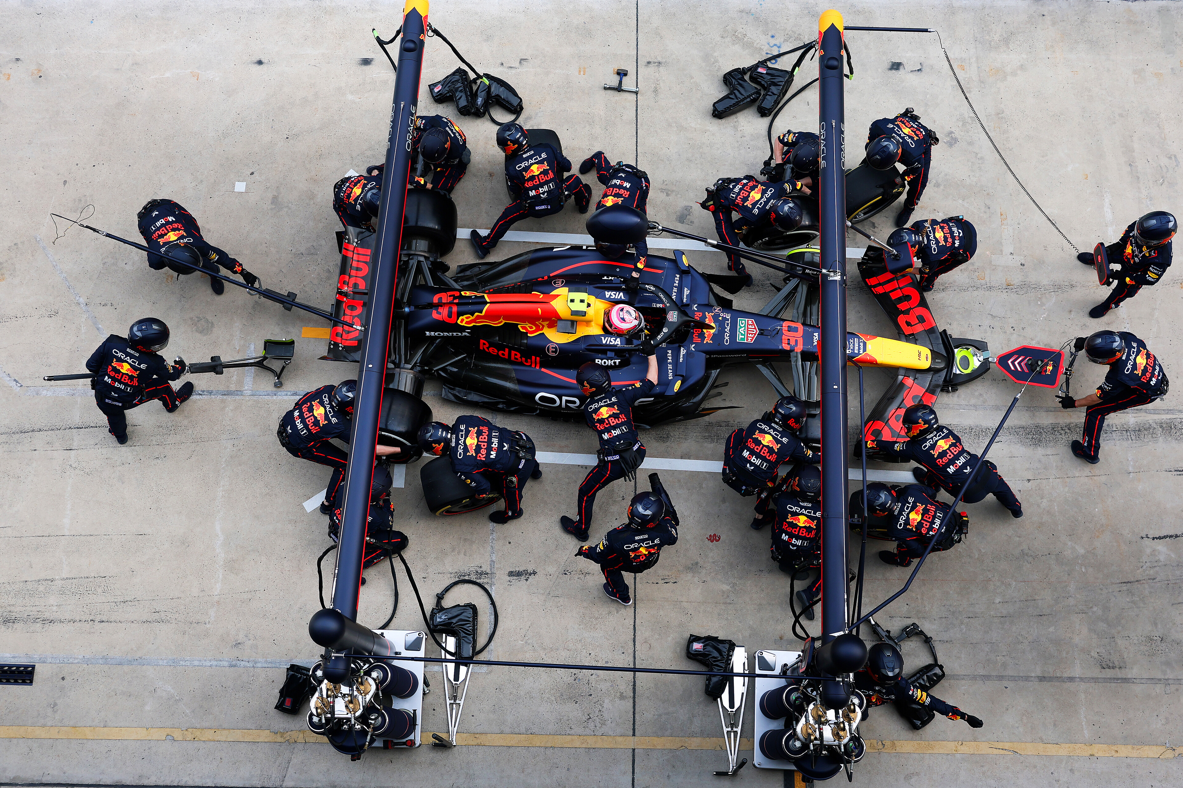 Red Bull mechanics get to work on Liam Lawson's car during the Chinese Grand Prix. Photo / Red Bull Content Pool