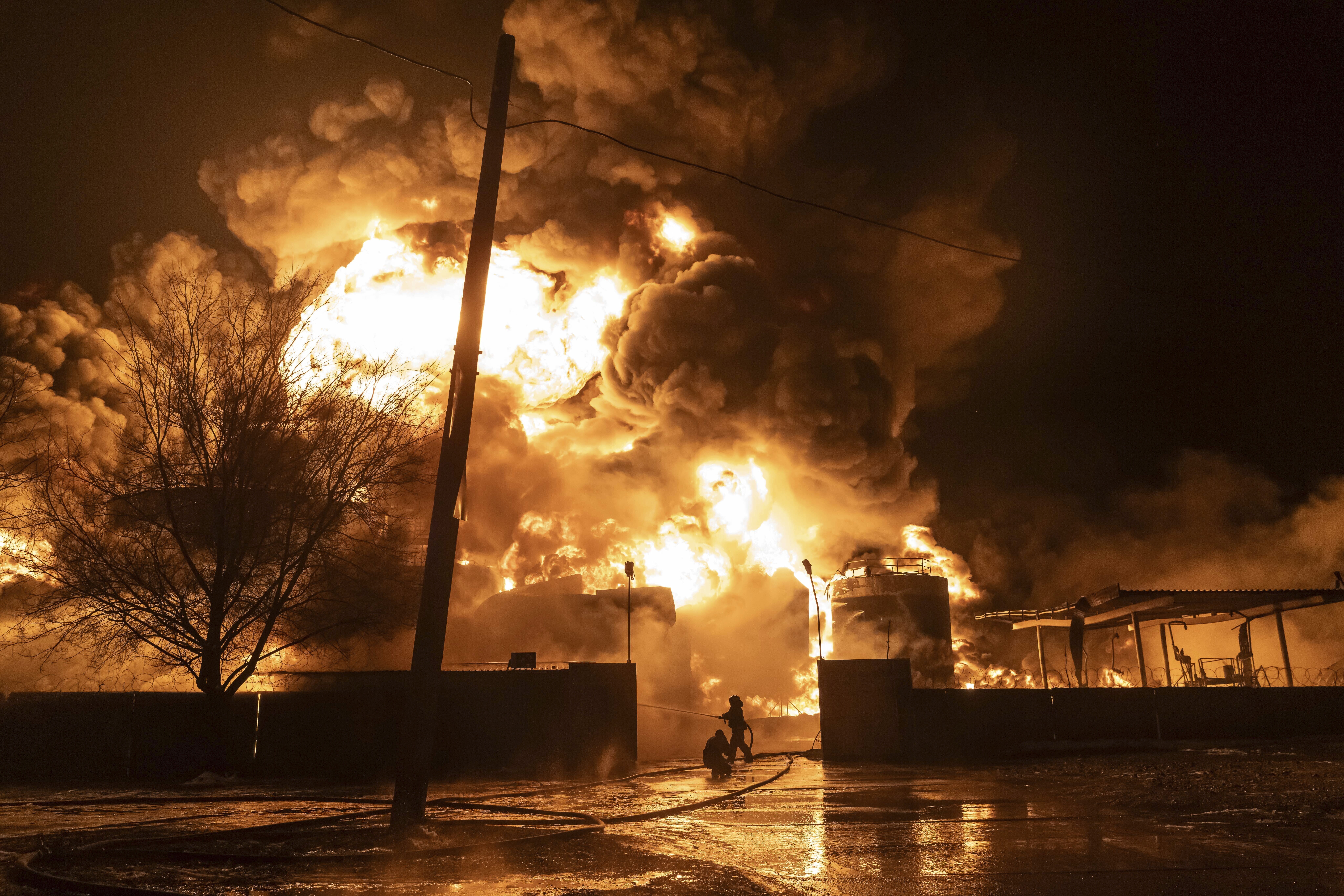 Firefighters extinguish a blaze after an attack on a residential neighbourhood in Kharkiv, Ukraine, Saturday, February 10. Photo / AP