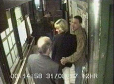 Princess Diana (C) and Dodi al-Fayed (R) wait at the rear service exit of the Ritz hotel in Paris in this August 31, 1997 video grab taken from CCTV footage received from the court holding the Coroner's Inquest. Photo / Reuters