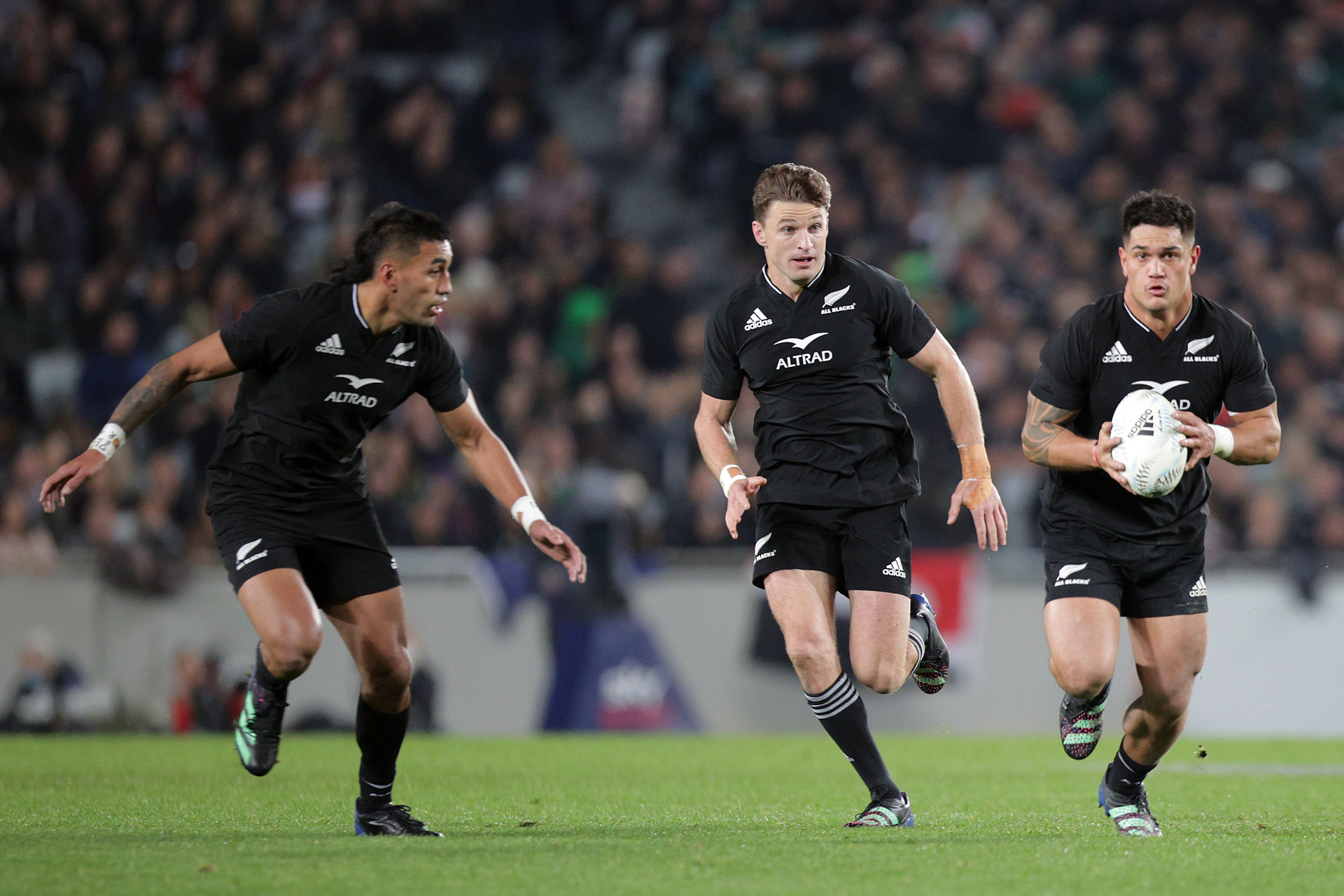 Quinn Tupaea (right) was one of six midfielders named in the squad – alongside Anton Lienert-Brown, Jordie Barrett, Rieko Ioane (pictured, left), Billy Proctor and newbie Timoci Tavatavanawai. Also pictured here is playmaker Beauden Barrett. Photo / Photosport