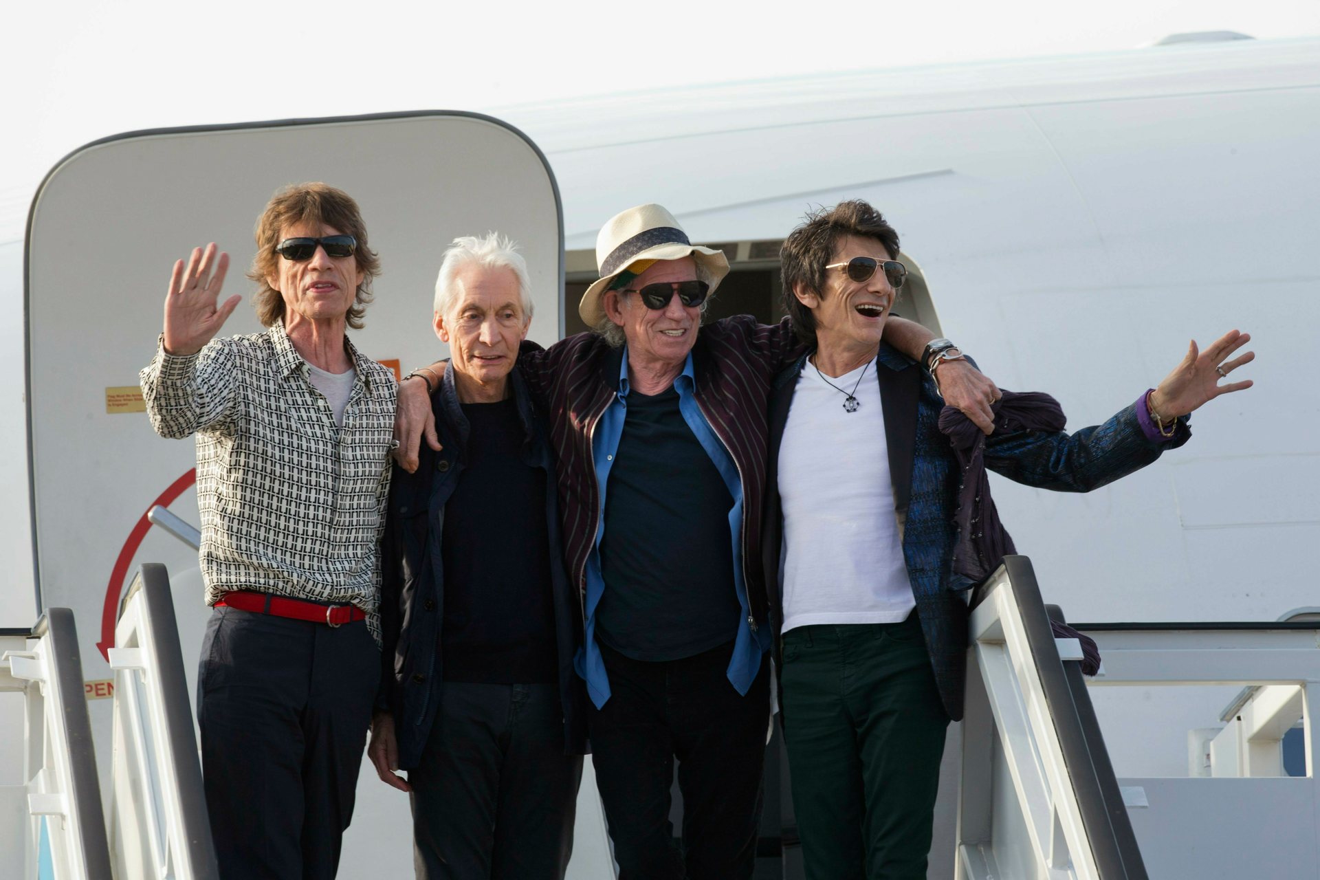 Members of The Rolling Stones, from left, Mick Jagger, Charlie Watts, Keith Richards and Ron Wood pose for photos at Jose Marti international airport in Havana, Cuba on March 24, 2016. Photo / AP