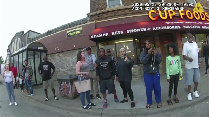 This May 25, 2020, file image from a police body camera shows bystanders including Darnella Frazier, third from right filming. Photo / AP