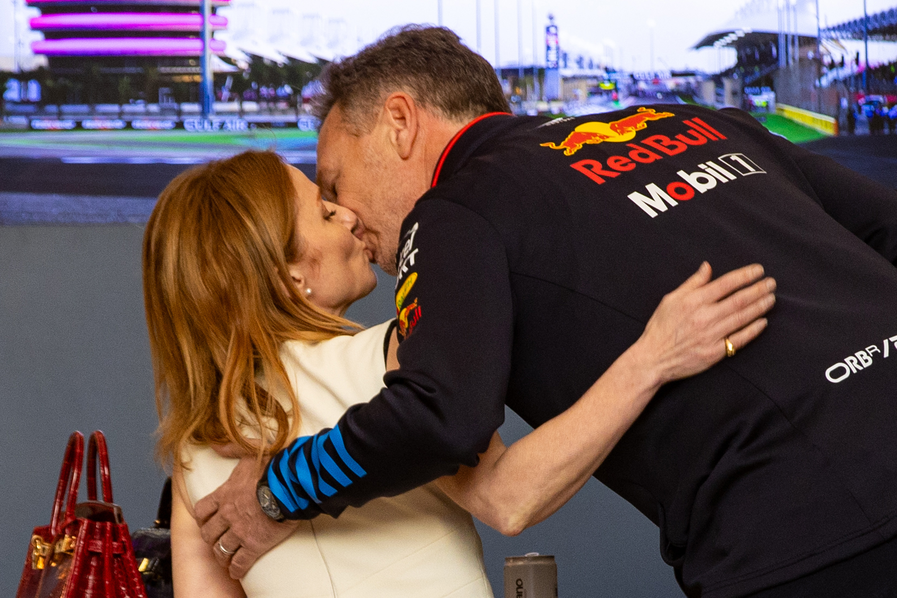 Oracle Red Bull Racing Team principal Christian Horner kisses wife Geri Horner ahead of the Grand Prix of Bahrain. Photo / Getty Images