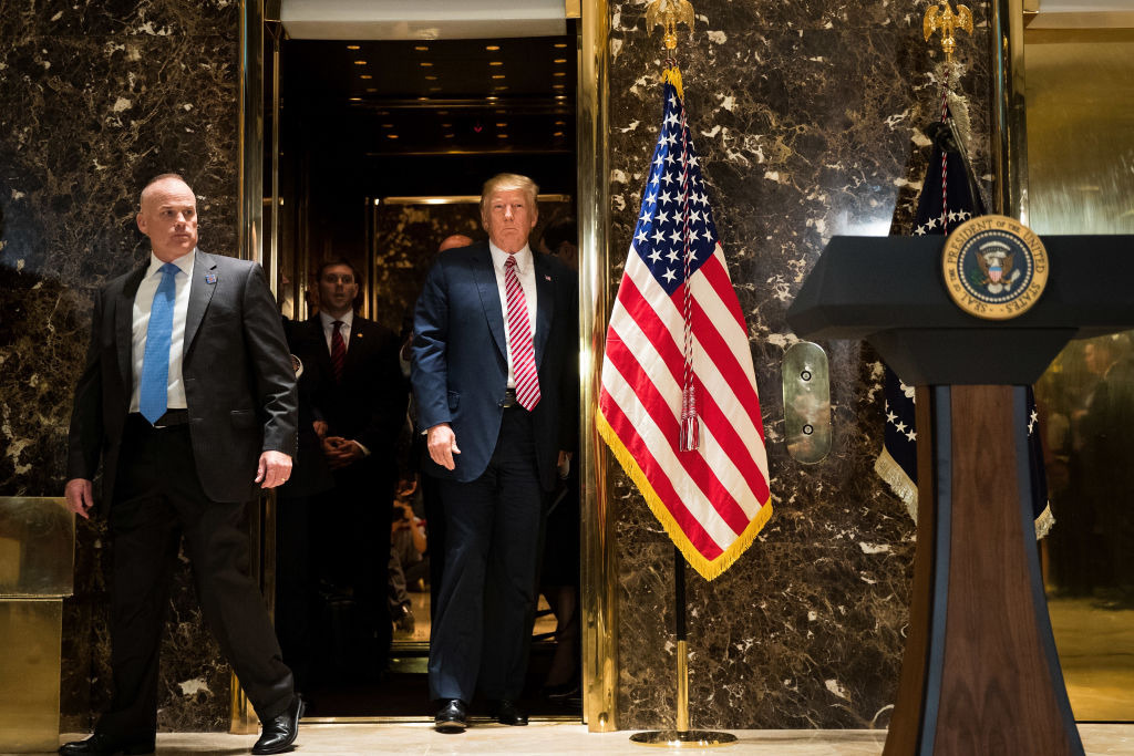 US President Donald Trump emerges from the elevator at Trump Tower. Photo / Getty Images