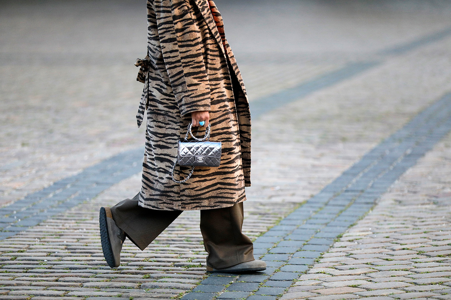 Dark grey Birkenstocks are donned on the street at Copenhagen Fashion Week 2021. Photo / Getty Images