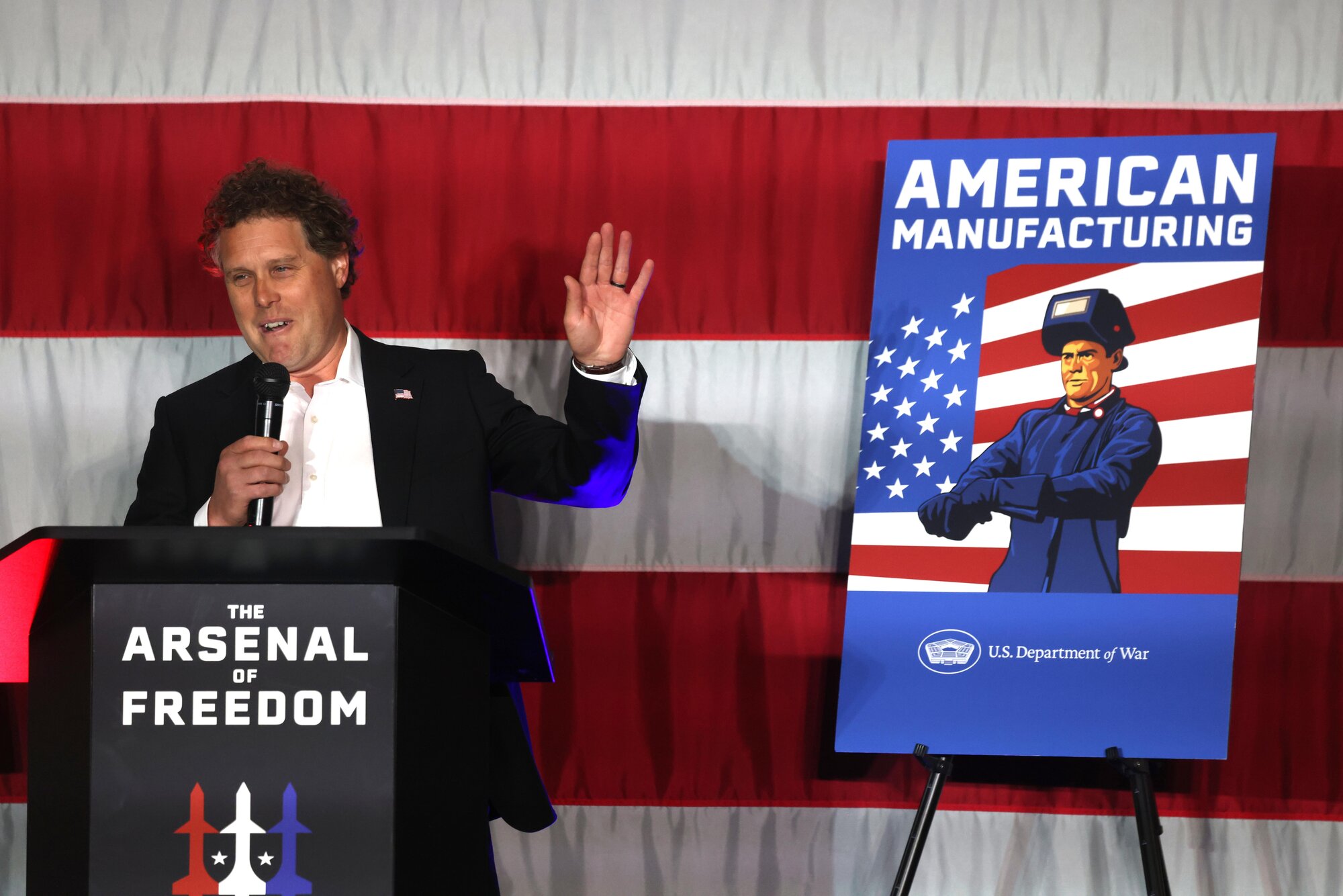 Rocket Lab founder Sir Peter Beck talking to employees at his firm's Long Beach, California, headquarters on January 9 during a visit by Secretary of War Pete Hegseth. Photo / Getty