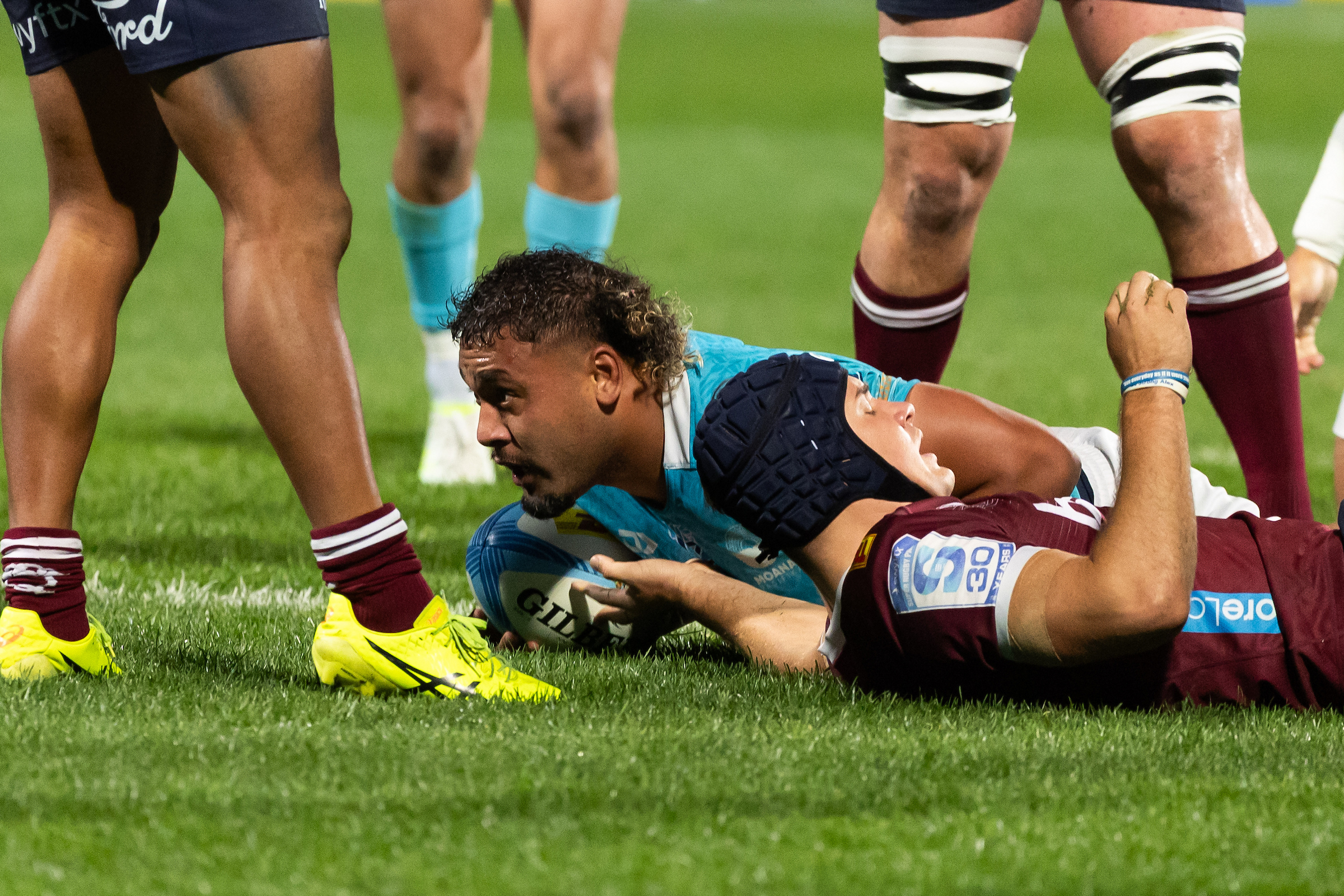 Moana Pasifika loose forward Semisi Tupou Ta'eiloa scores a try in the Super Rugby Pacific clash against the Reds. Photo / Photosport