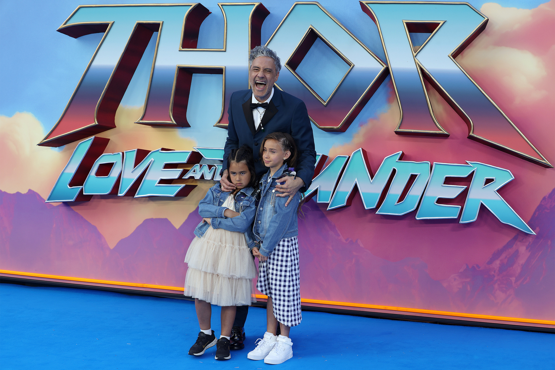 Taika Waititi with his kids, Matewa Kiritapu, 6, and Te Hinekāhu, 10, at the Thor: Love and Thunder premiere in London. Photo / Neil Mockford, FilmMagic