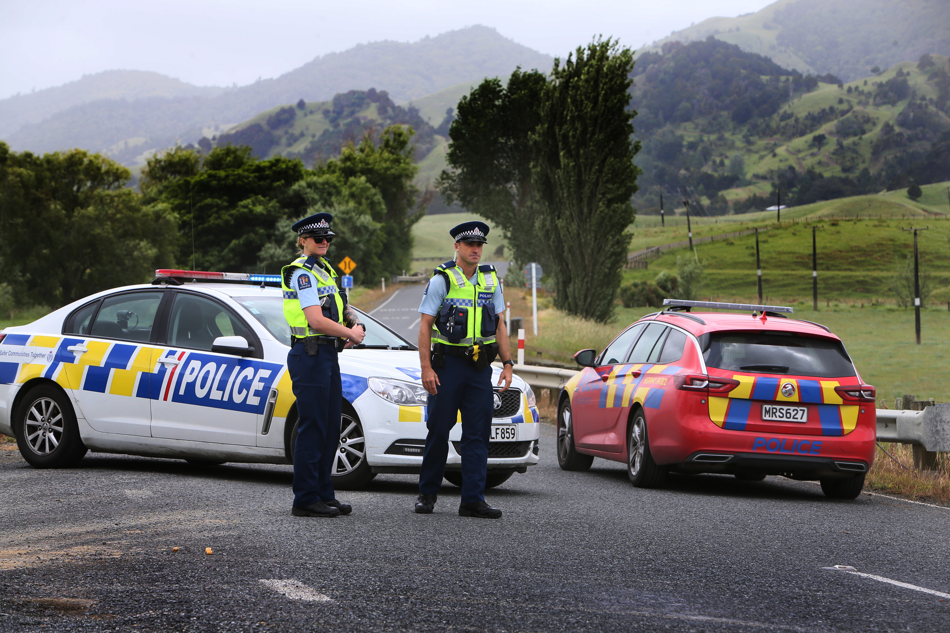 Police officers at the scene of the shooting on Tangowahine Valley Rd in December 2020. Photo / Tania Whyte
