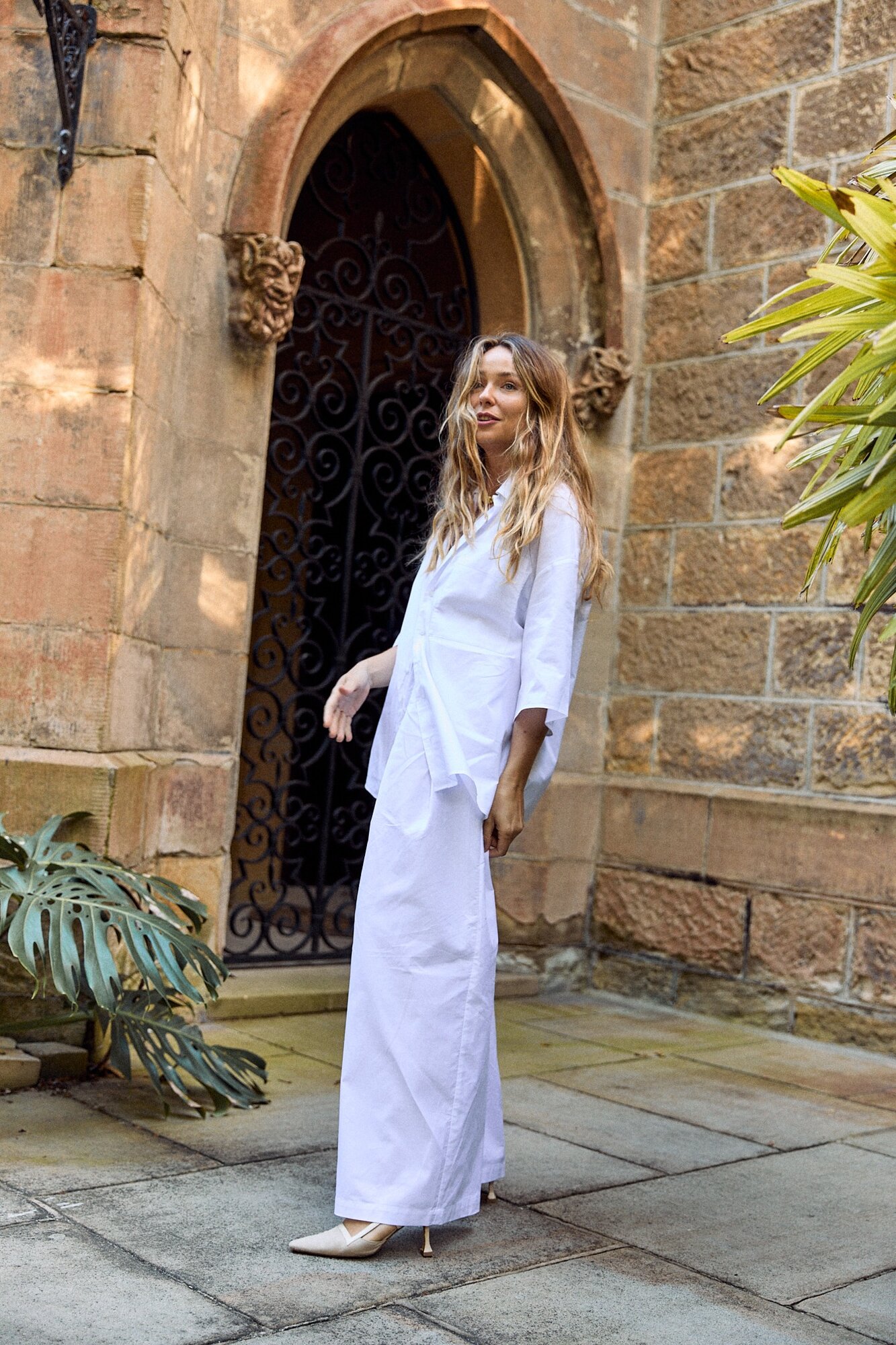 An oversized button-up and matching trousers.