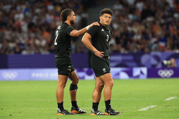 Tone Ng Shiu is consoled by Brady Rush after losing to South Africa. Photo / Photosport