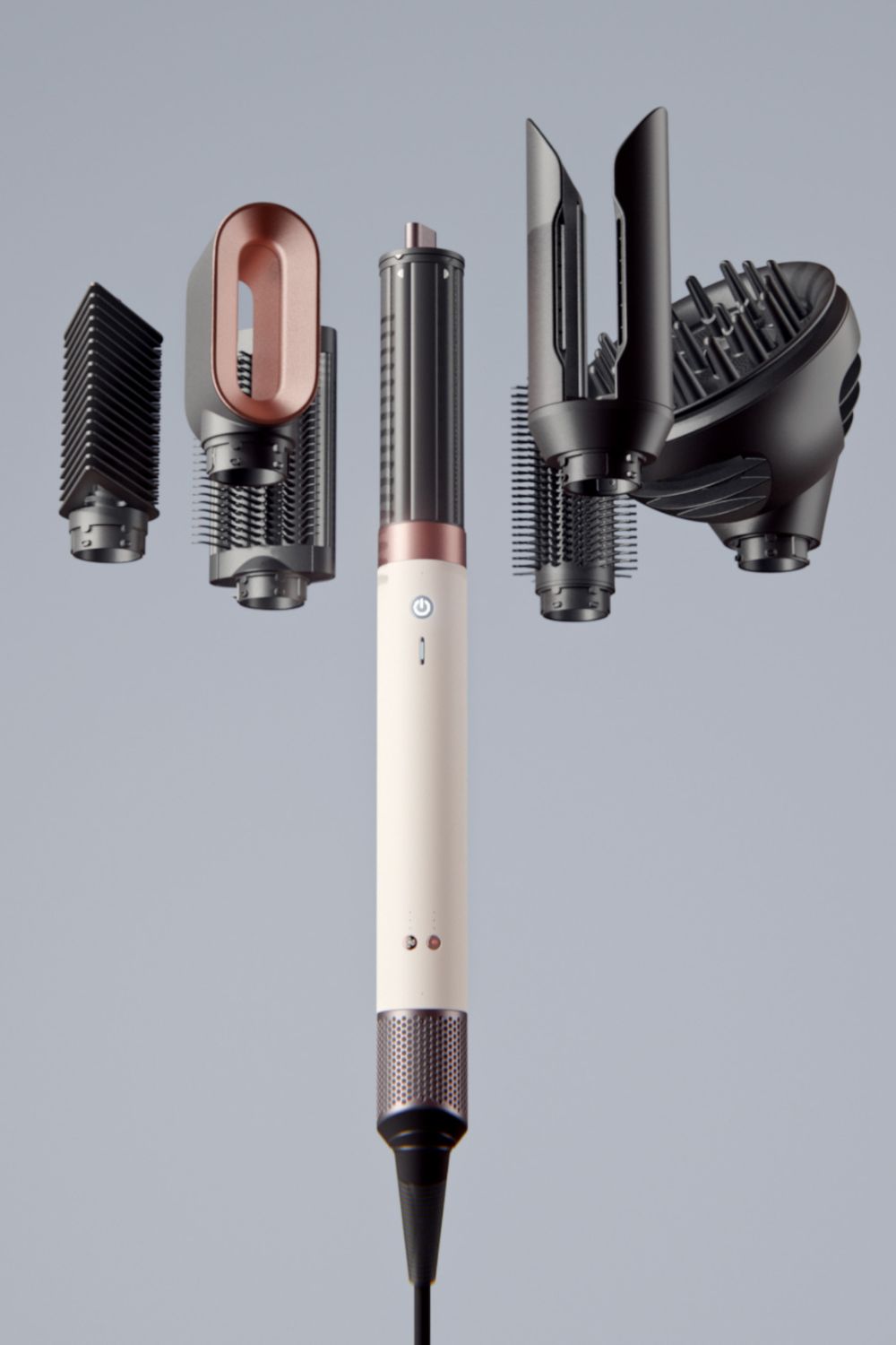 Dyson's newest addition is the Coanda 2x, which comes with a suite of attachments to smooth, straighten, curl and dry hair. Photo / Supplied
