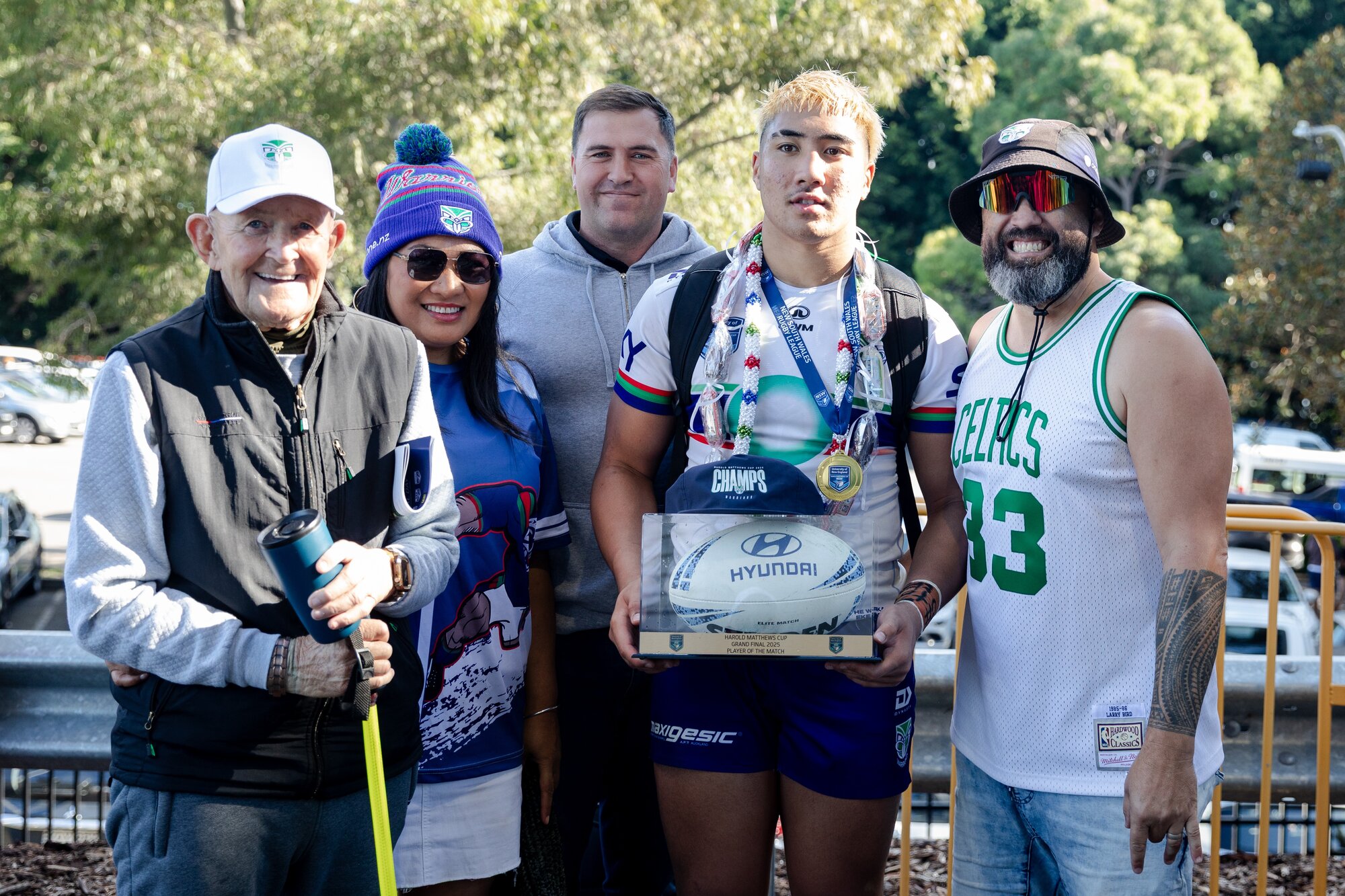 Young league prospect Bishop Neal with (from left) poppa Lee Neal, mum Betsy Neal, manager Jordan Friend and dad Trevor Neal. Photo / Rome Bennett Photography