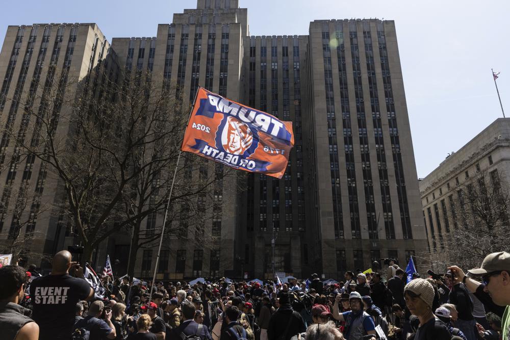Protesters gather in Collect Pond Park across the street from the Manhattan district attorney's office. Photo / AP